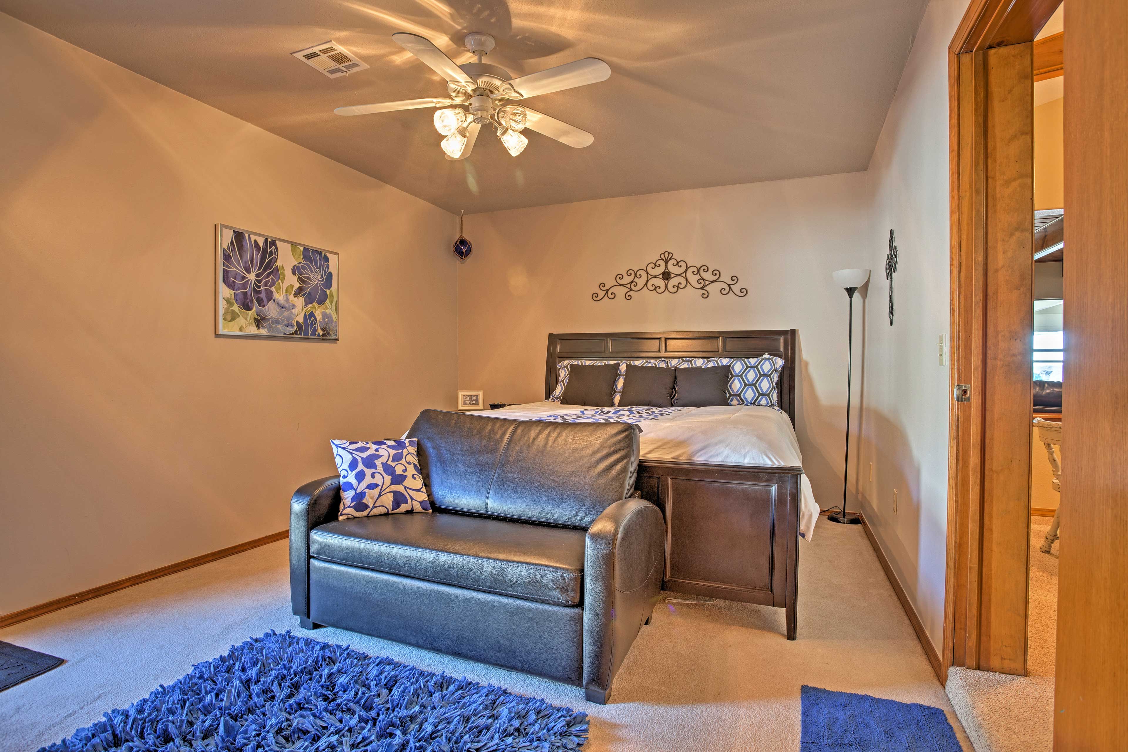 This plush king bed ensures a peaceful night of rest.