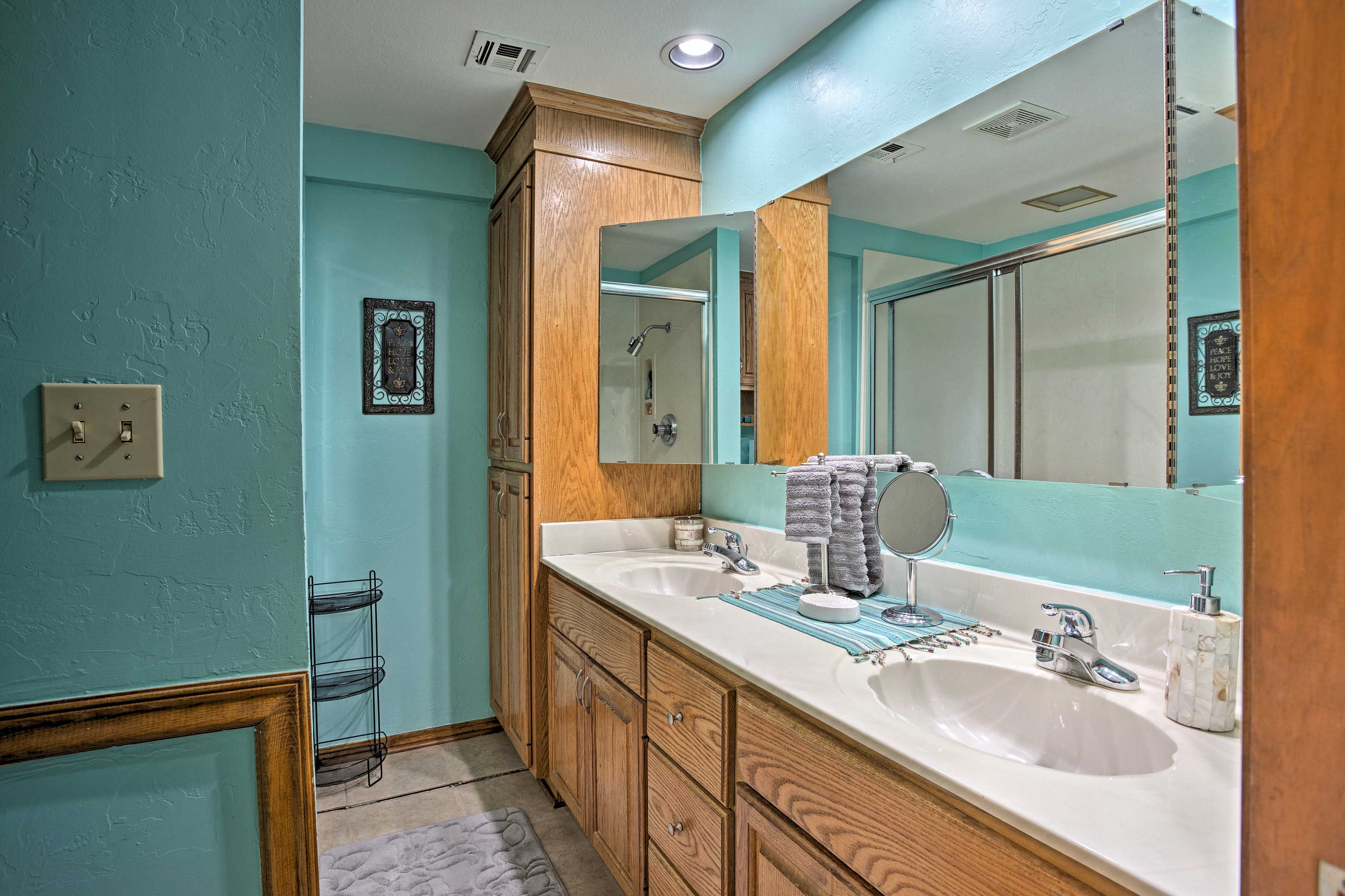 An en-suite bath sits right off the bedroom