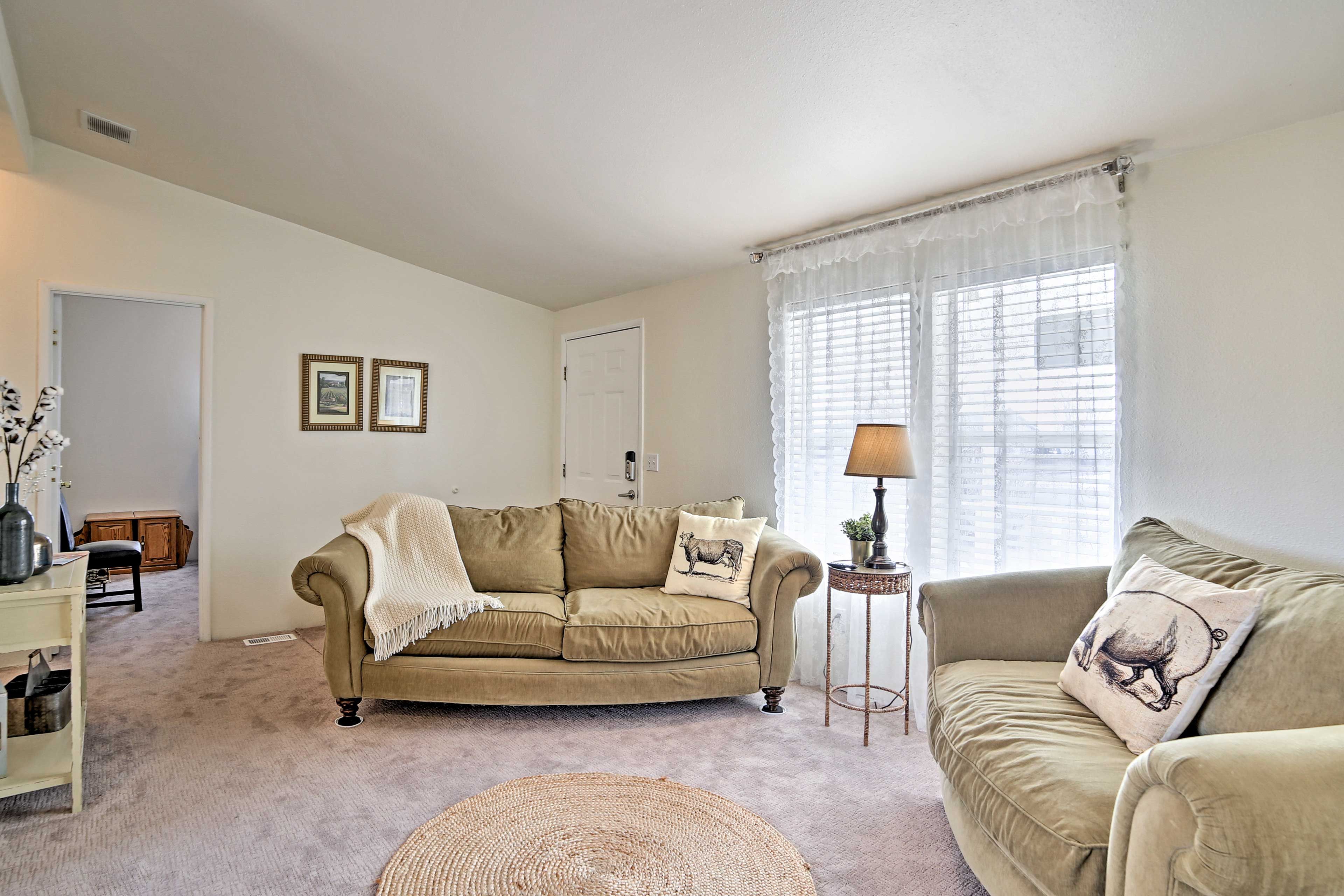 Ample sunlight streams in from the windows throughout the home.