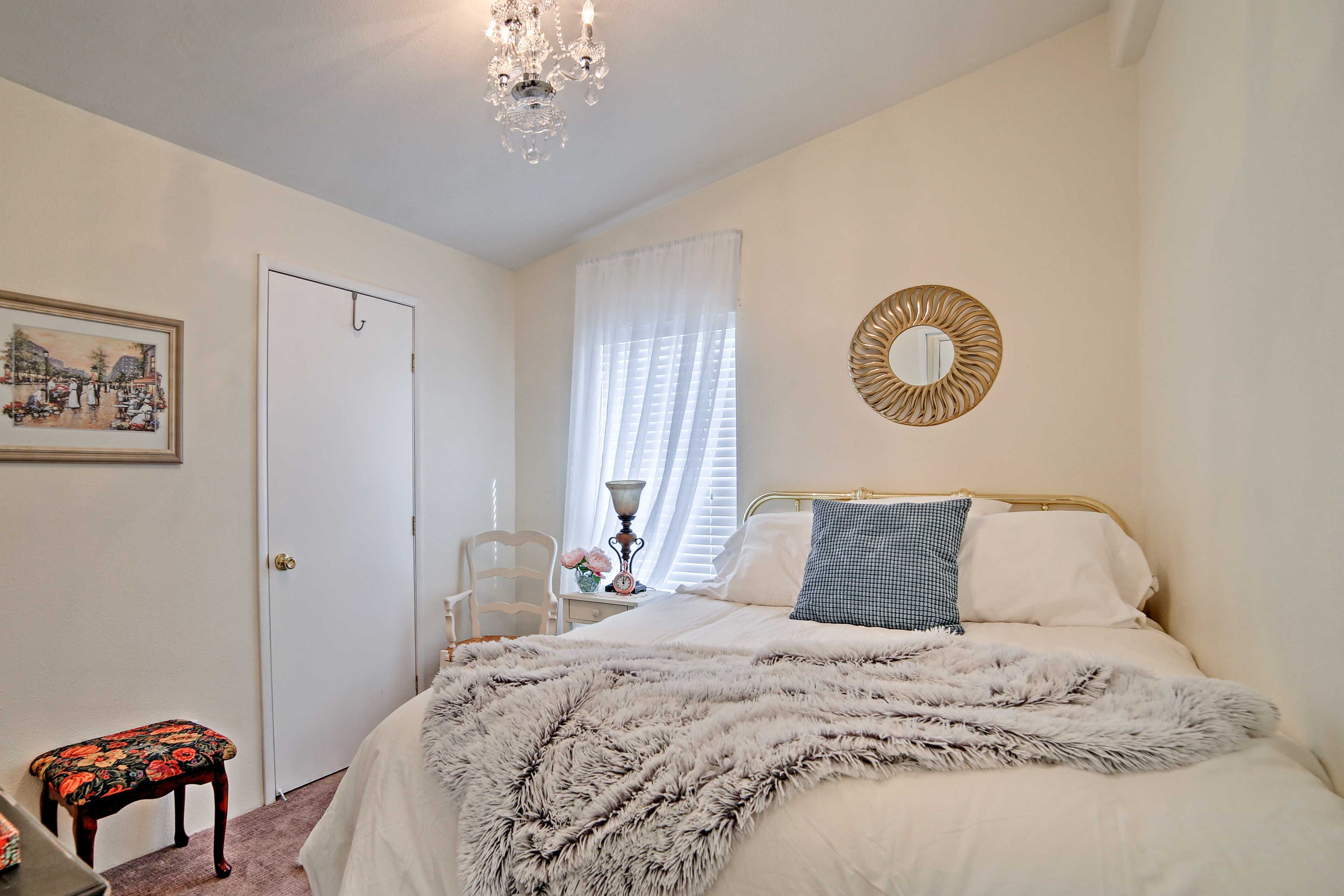 Peaceful slumbers await you in this comfy queen bed.