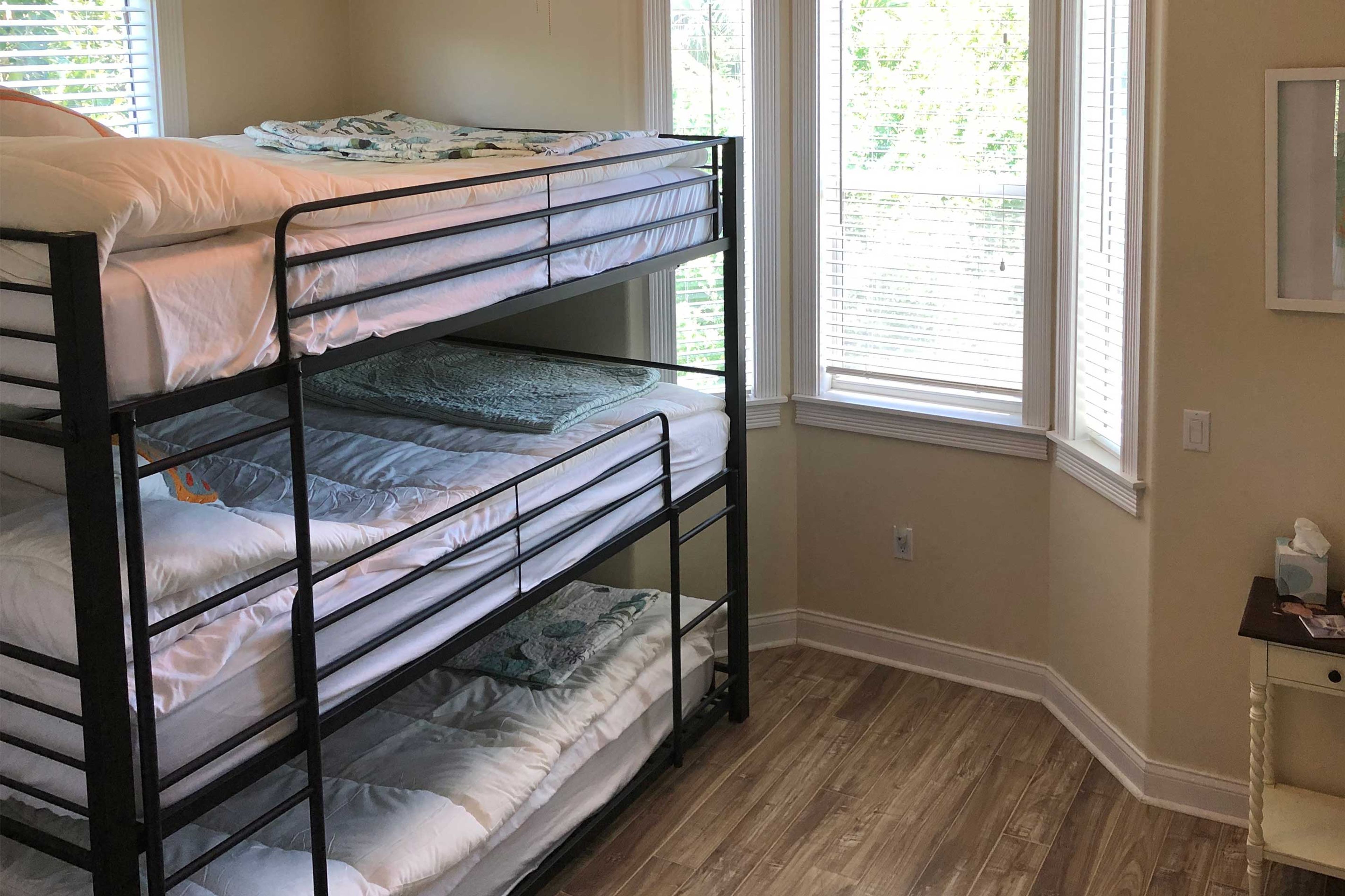 Two can share the third bedroom, equipped with a new triple queen bunk bed.