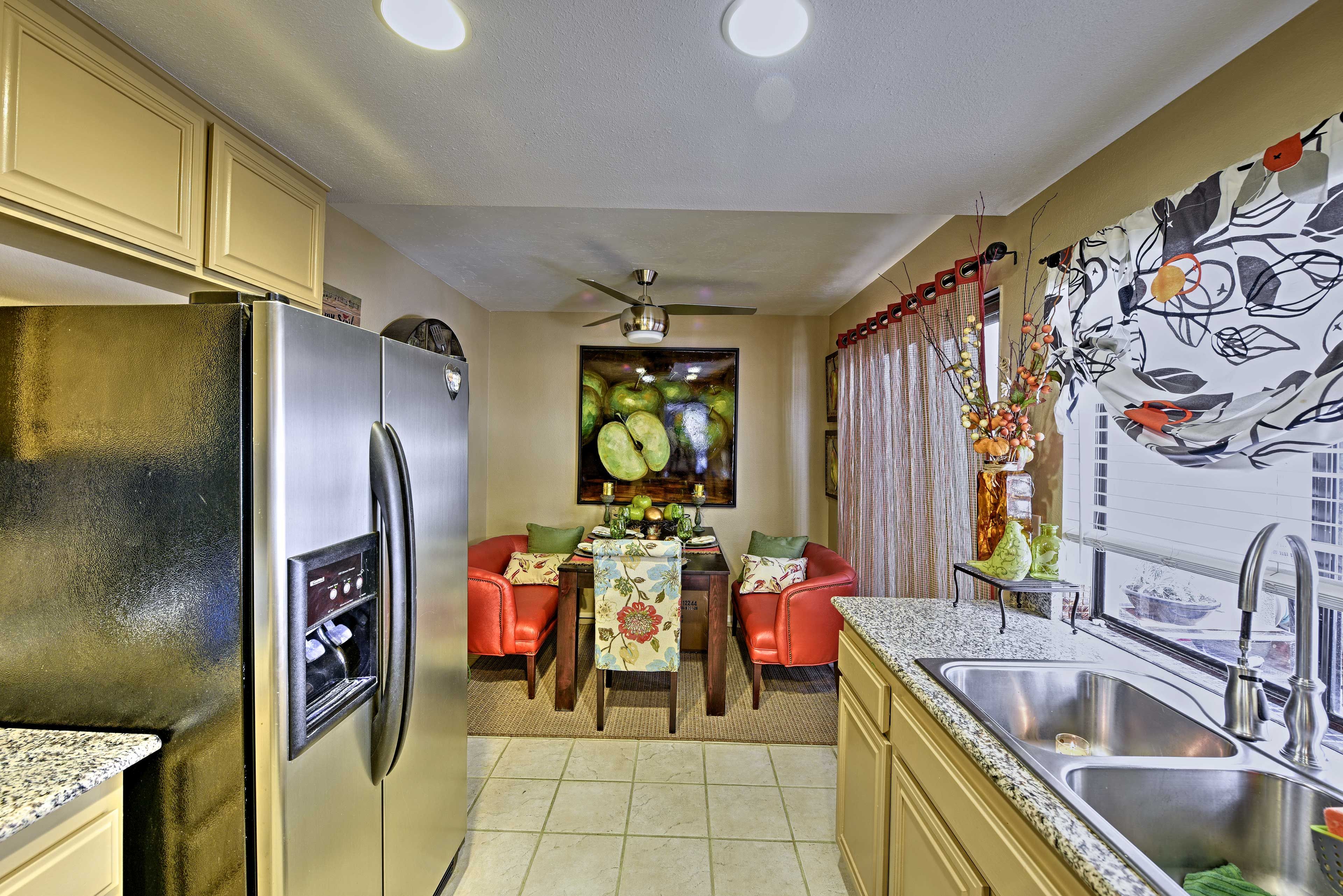 There is an additional glass sliding door next to the kitchen for patio access.