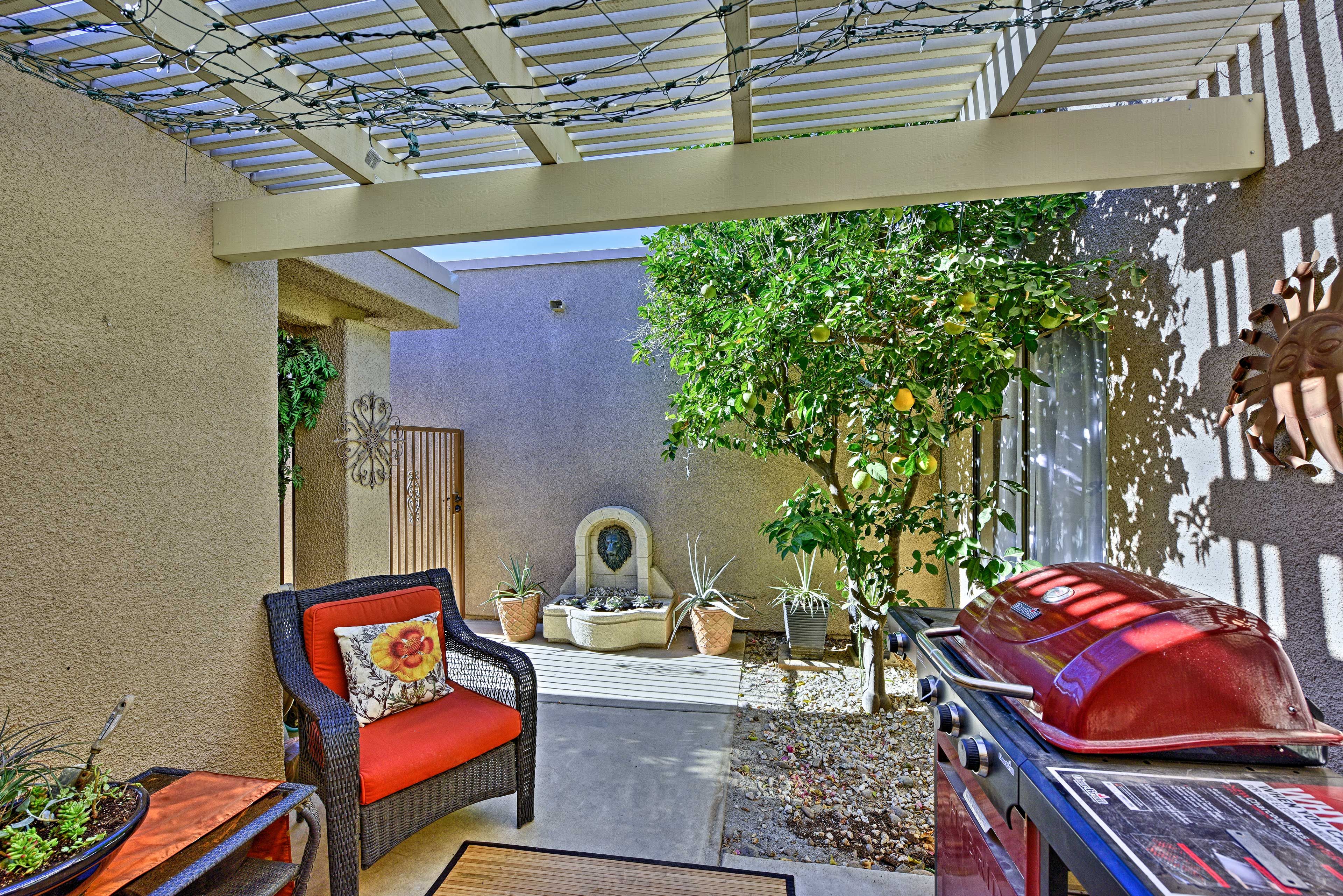 Grill up a feast in the foliage filled courtyard.