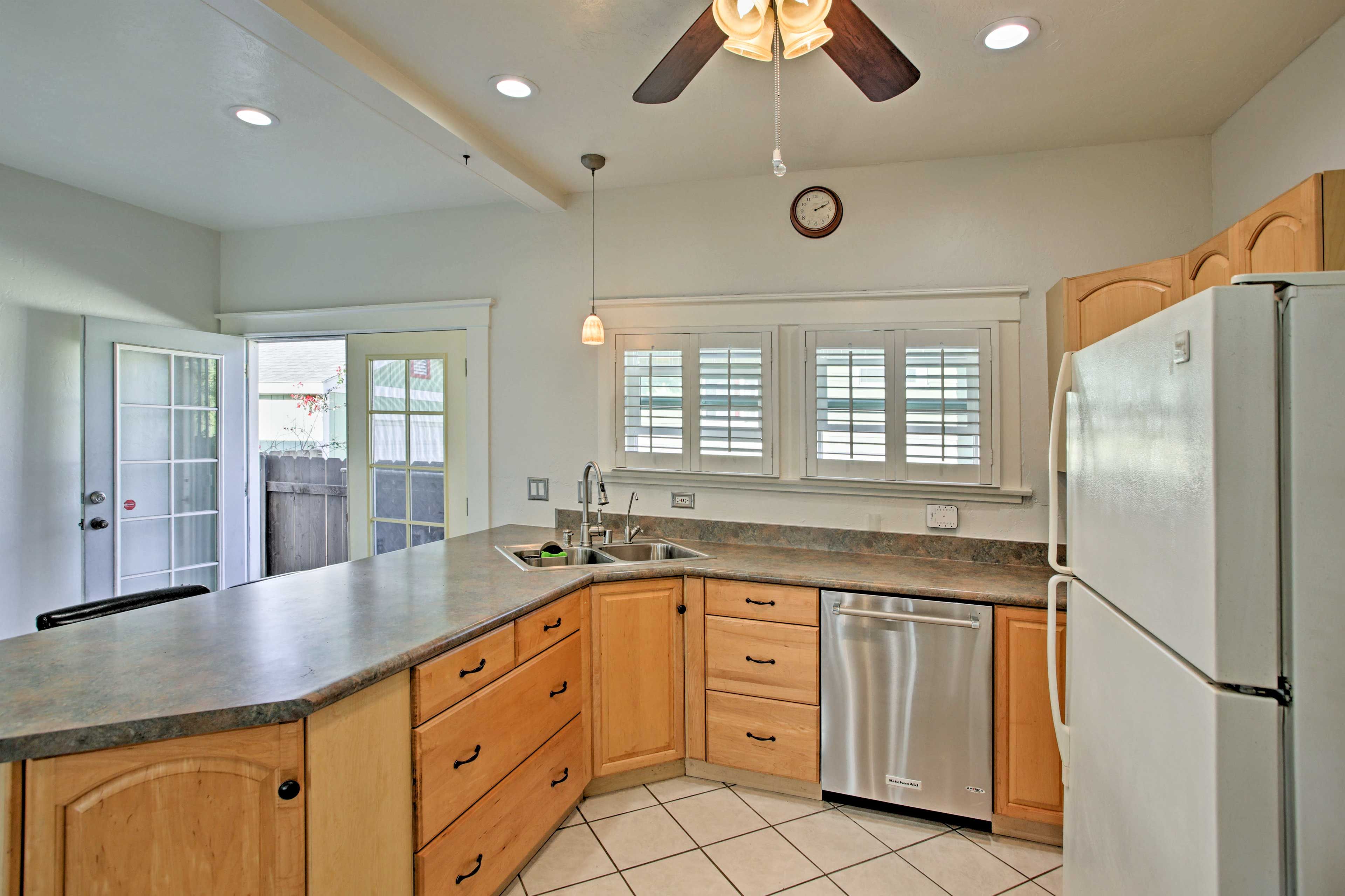 The kitchen is fully equipped with modern appliances and cookware!