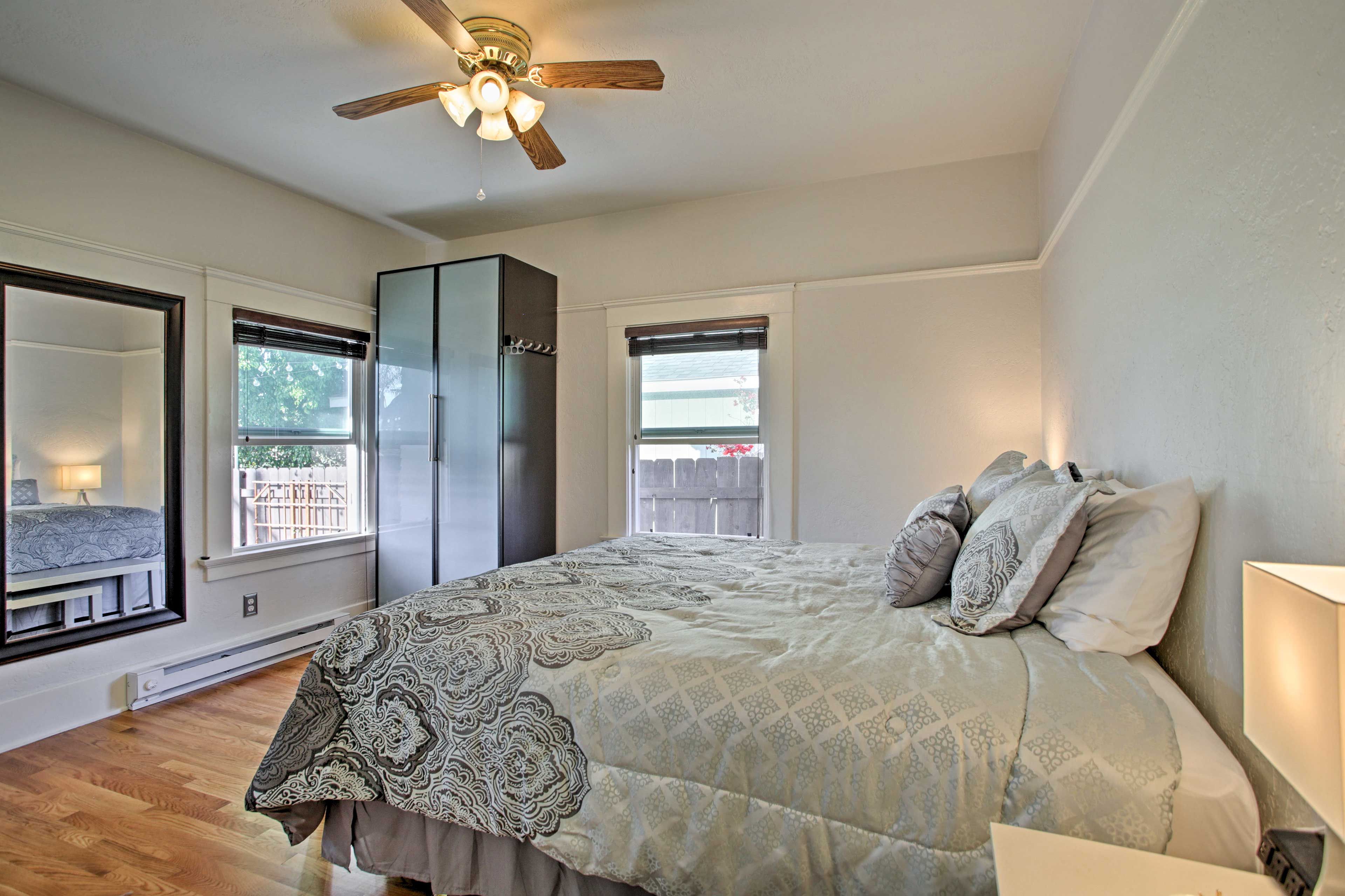 Natural light illuminates the room through large windows.