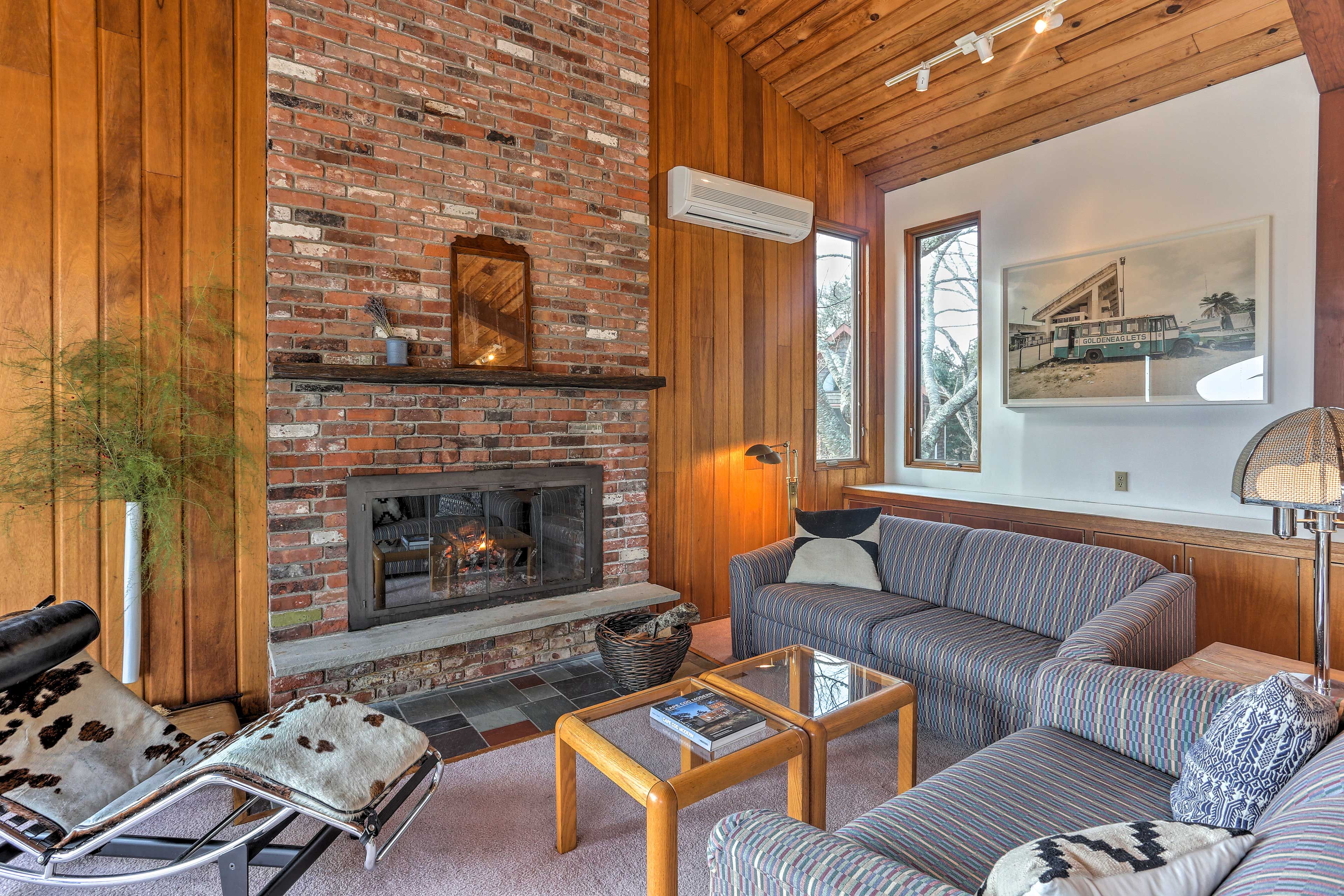 Curl up on one of the couches next to the wood-burning fireplace.