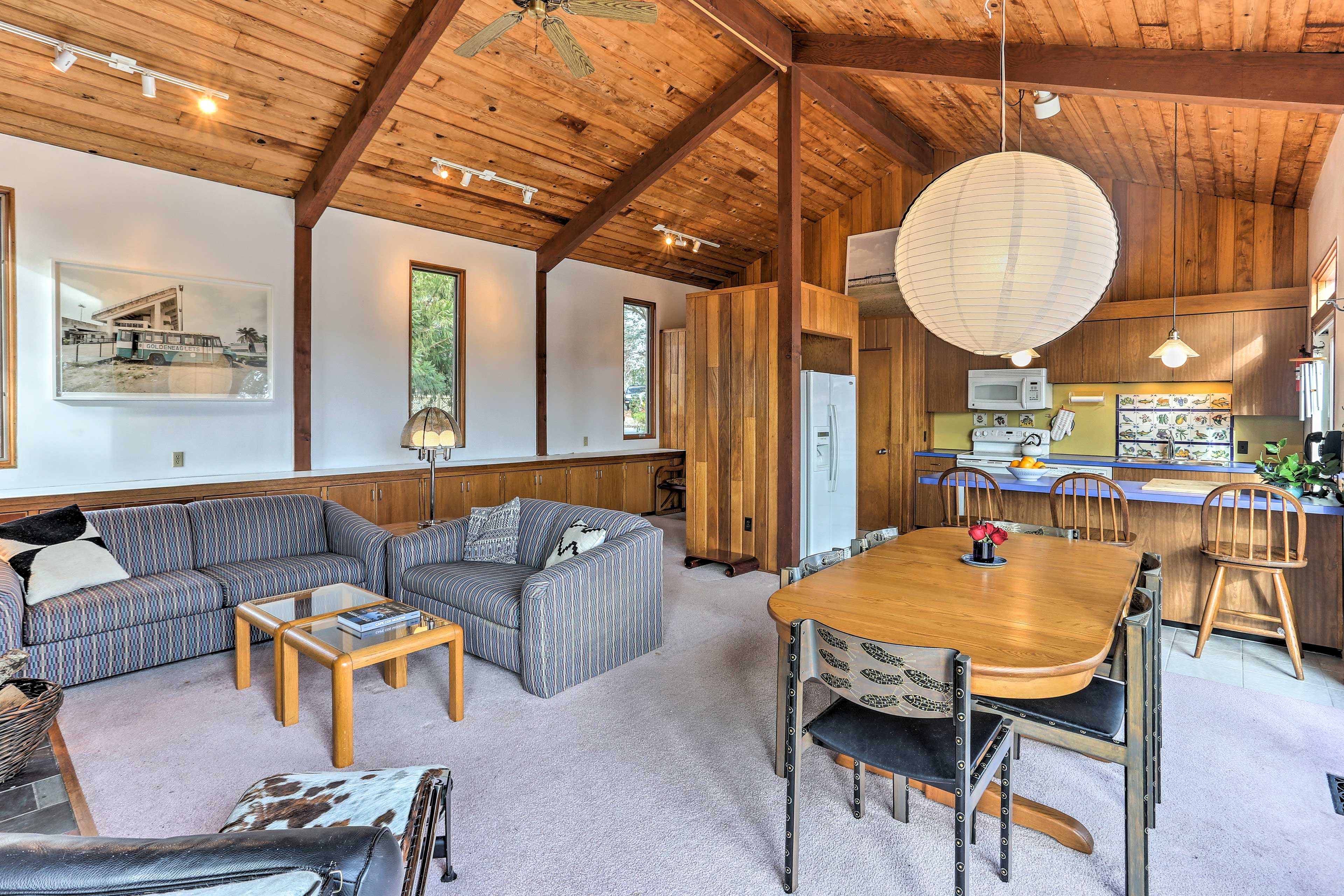 An open floor plan combines the living area, dining room, and kitchen.