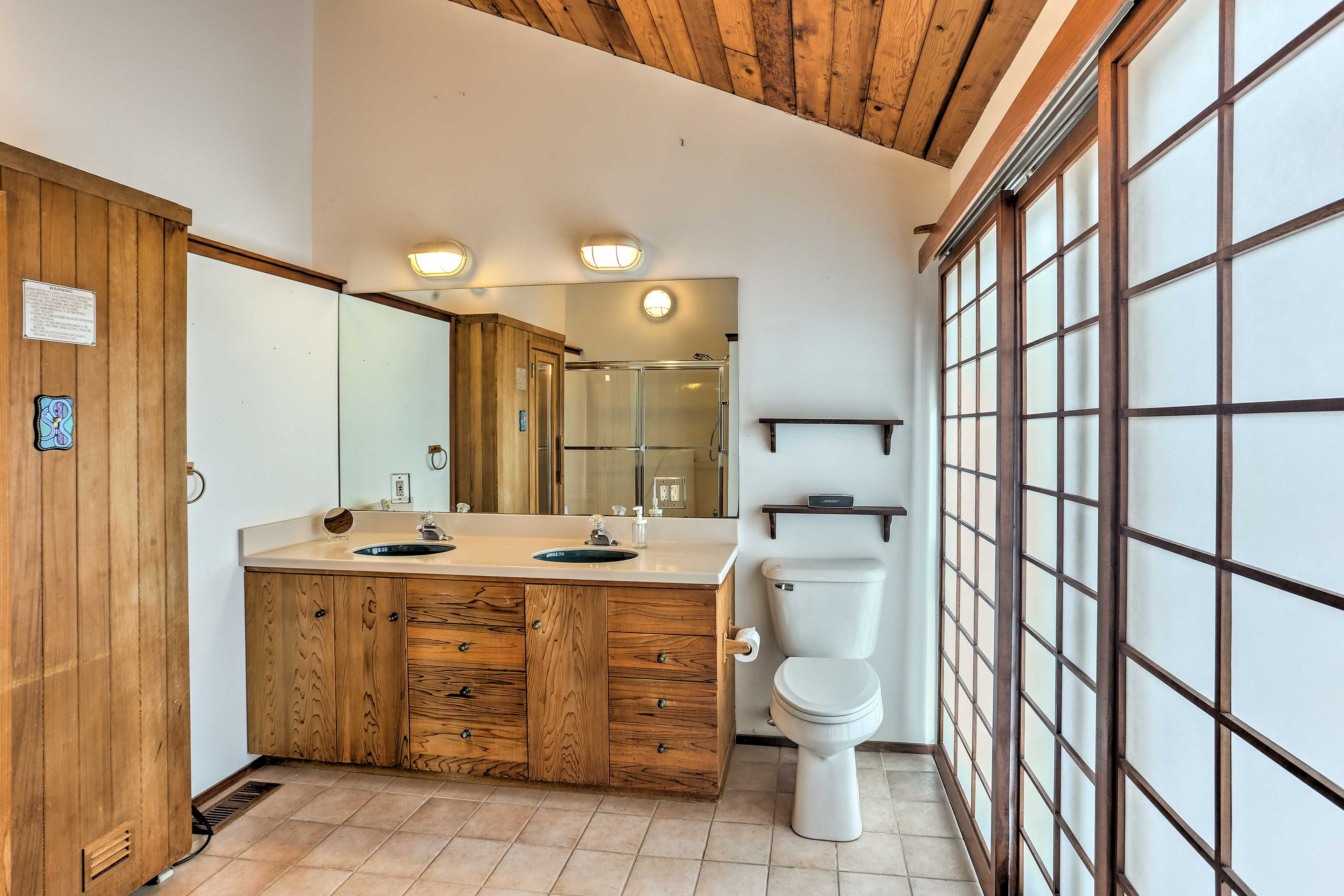 The en-suite bathroom features a sauna for ultimate relaxation!