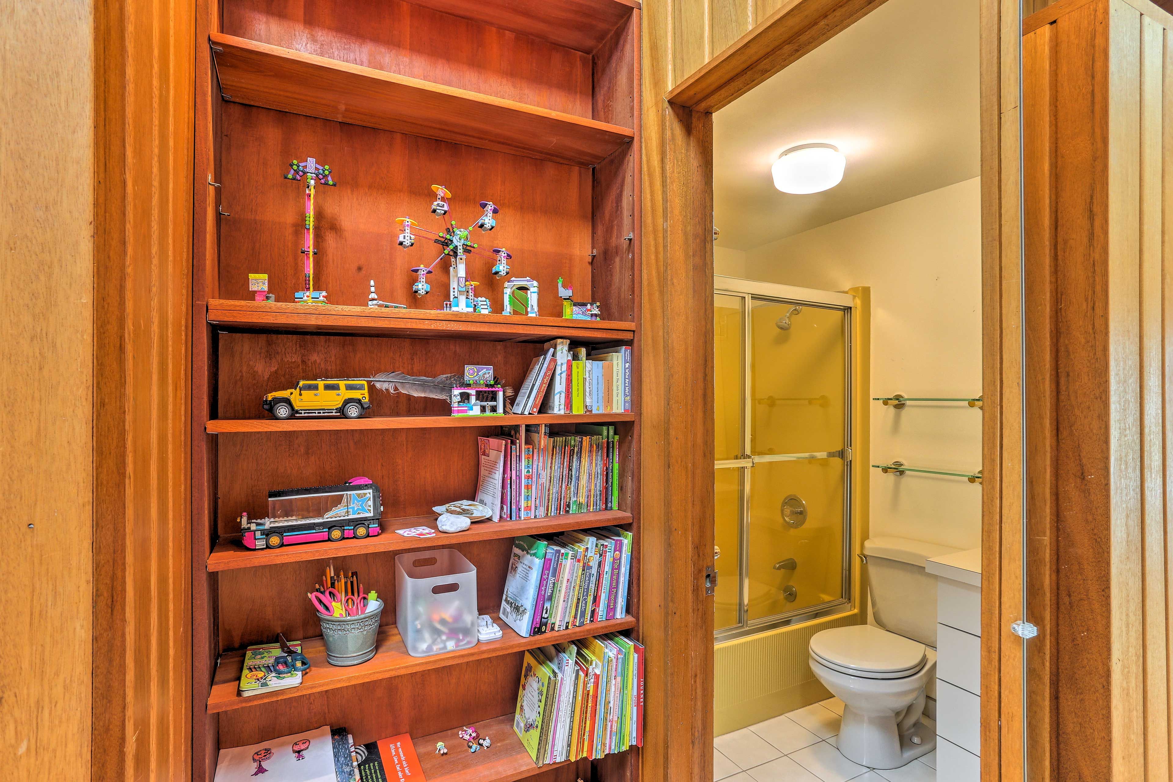 There are 3 bathrooms in the home, including the one in the separate cottage.
