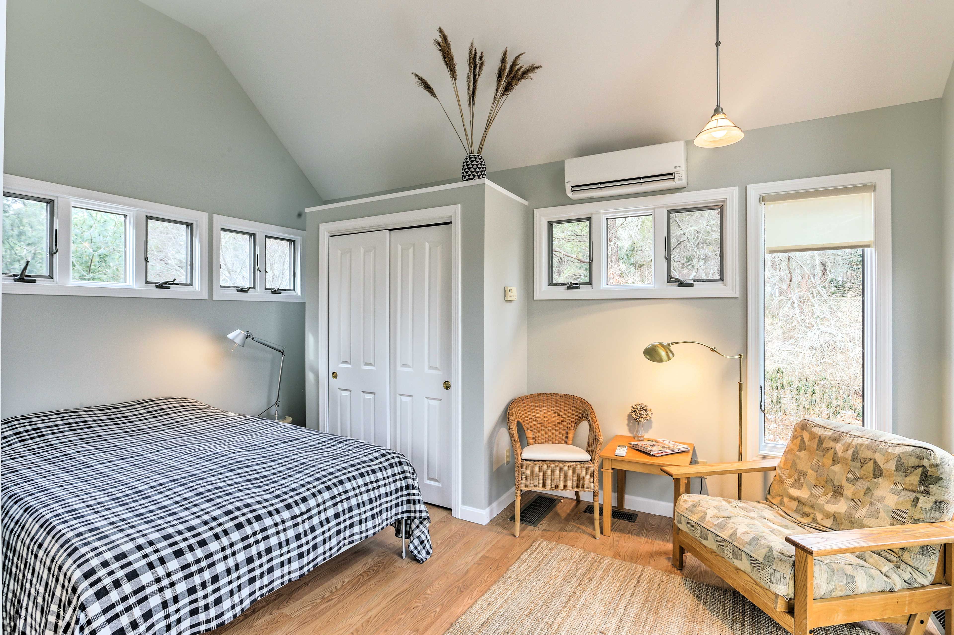 Kick back in the arm chair or drift off to sleep on the queen bed.