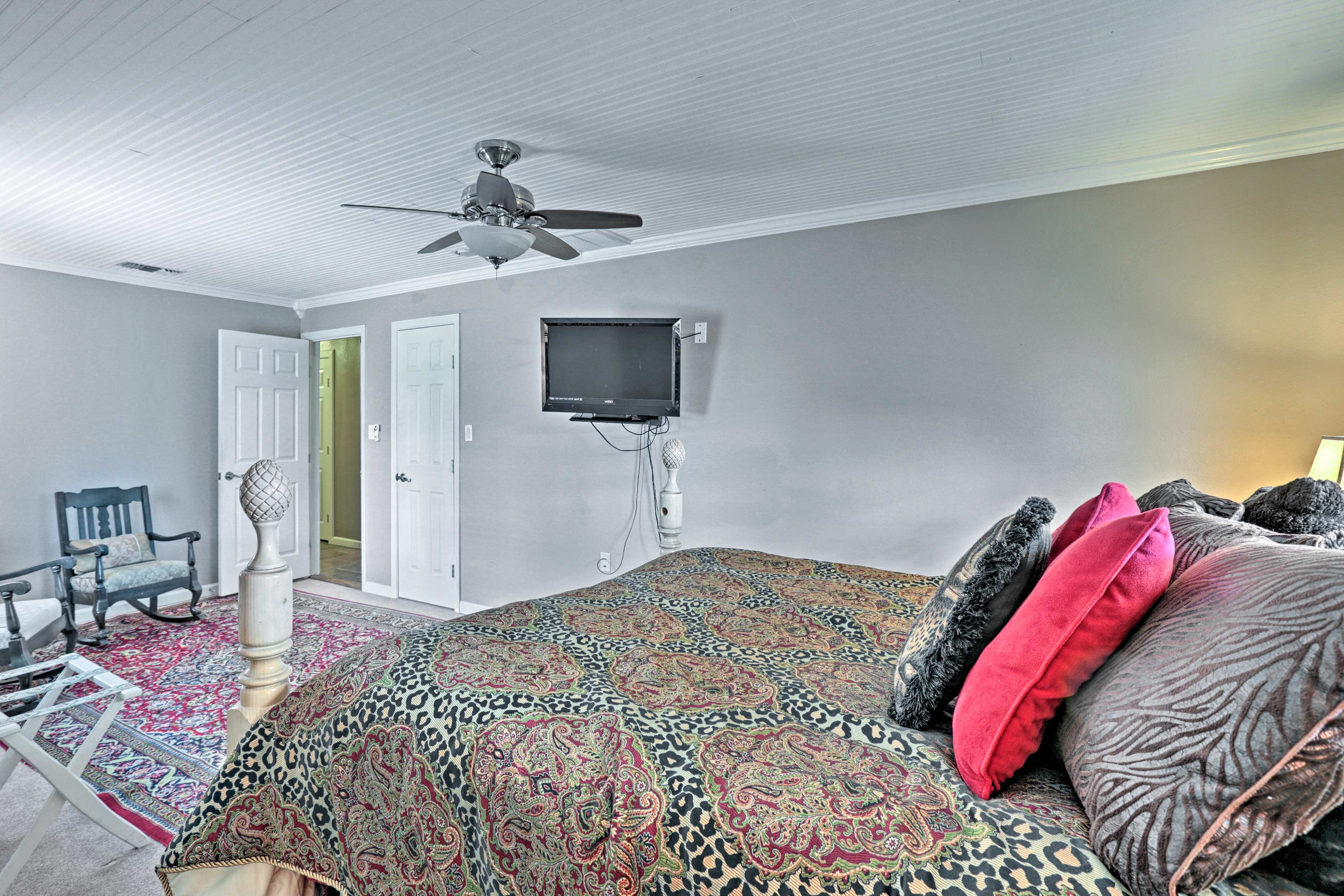 You'll find a flat-screen TV in this bedroom as well.
