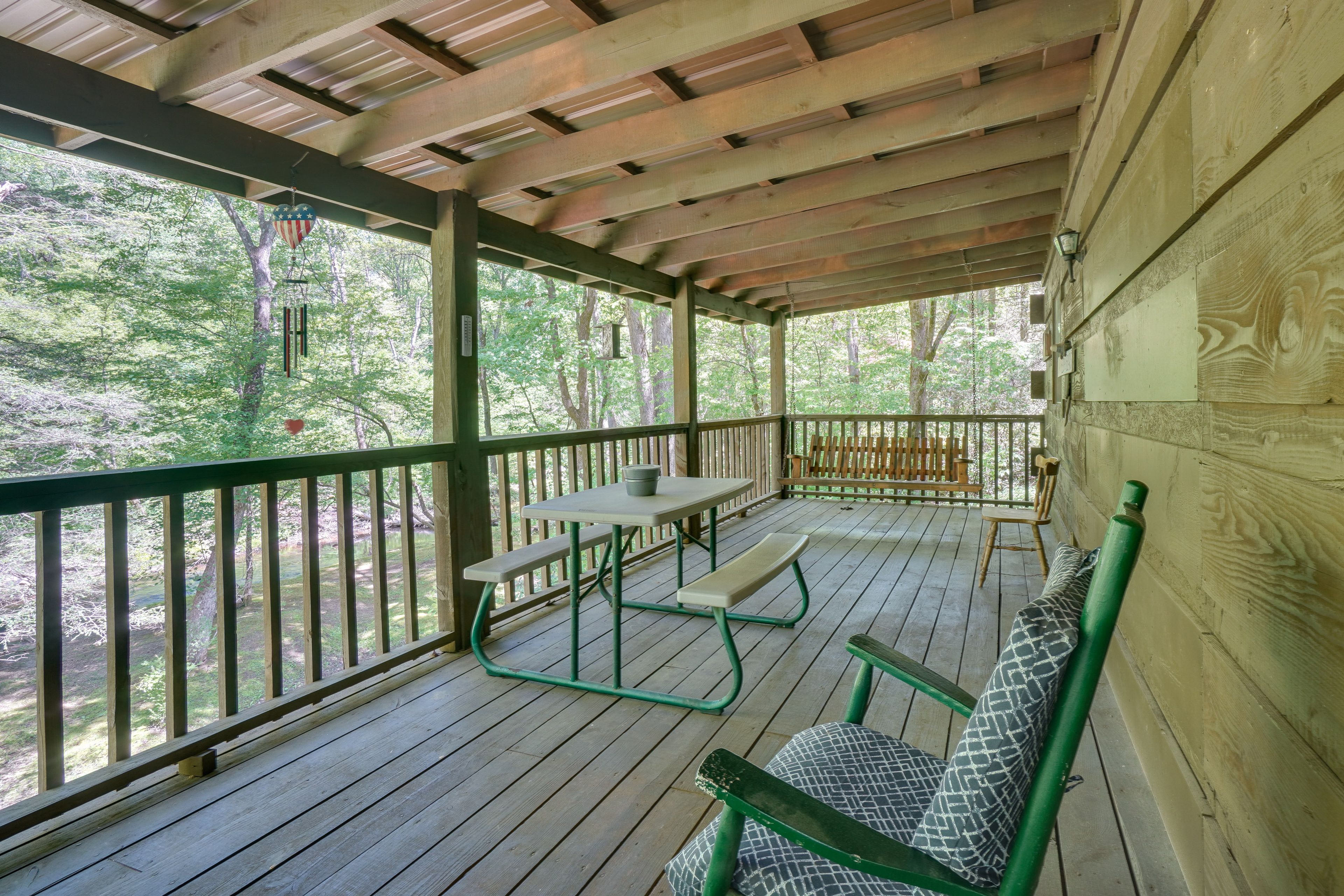 Furnished Porch | Outdoor Dining Area