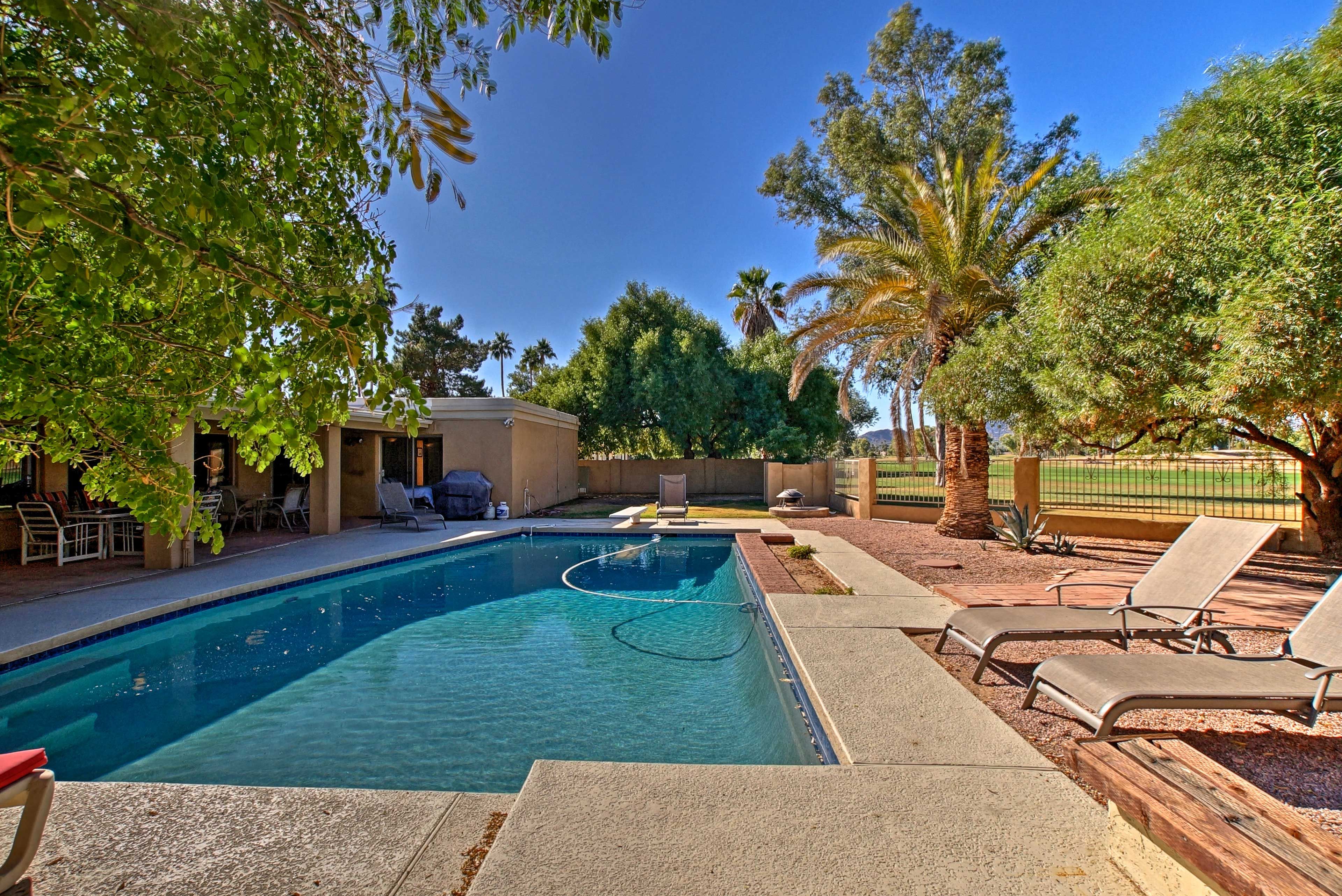 Watch the last golfers finish up on the McCormick Ranch Golf Club from the pool.