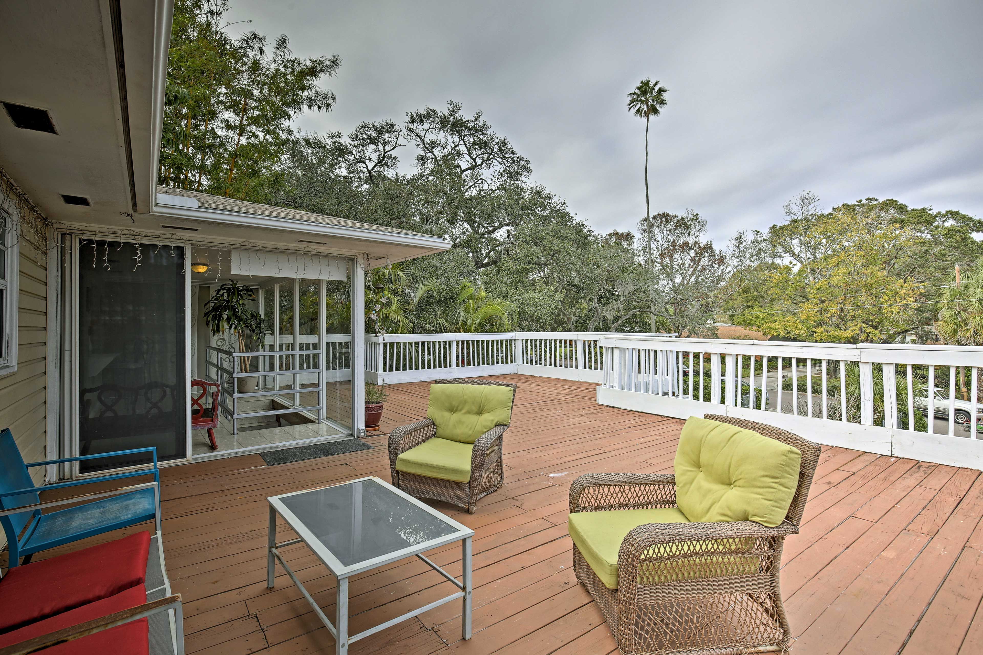 Enjoy views of the surrounding lush forest and neighborhood.