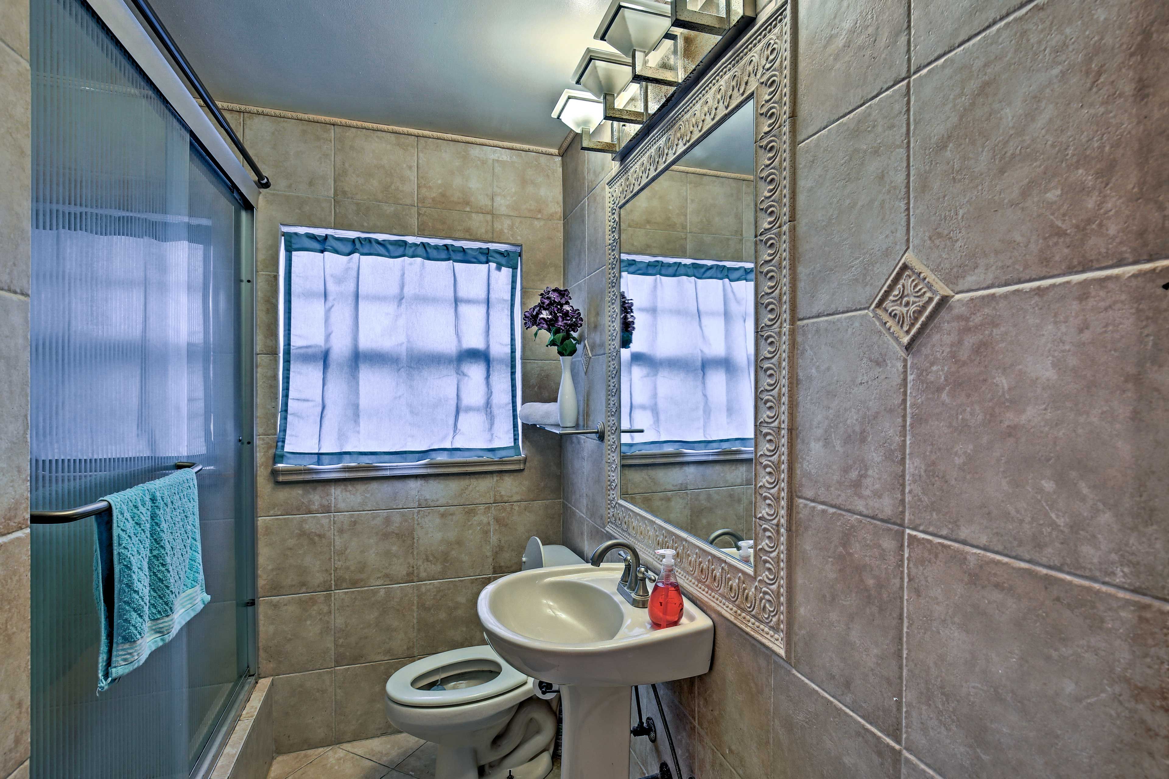 After a day at the beach, shower off in one of the 2 full bathrooms.