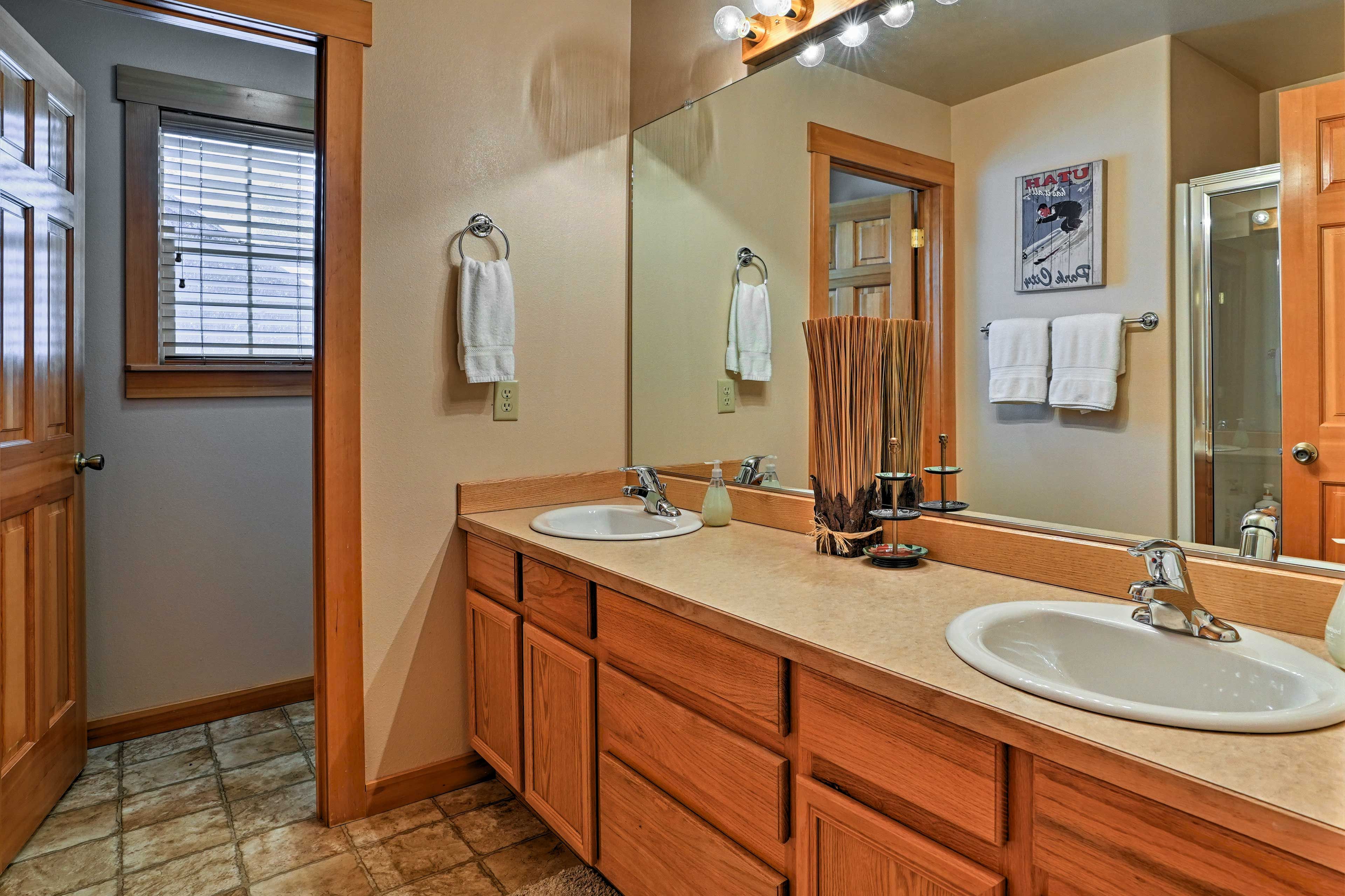 His-and-her sinks provide ample counter space to couples.