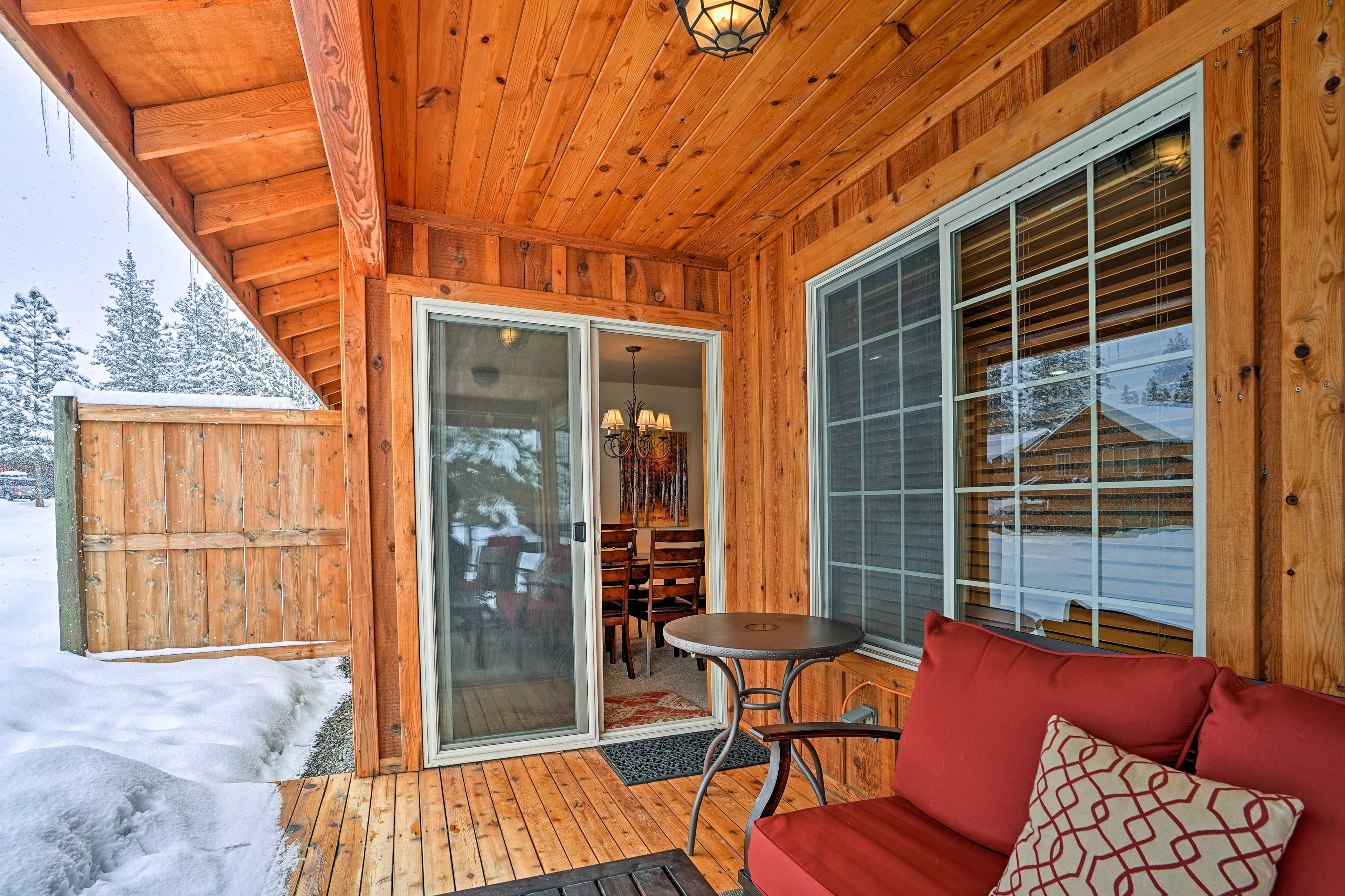 Take in the sights and sounds of the surrounding area from the covered patio.