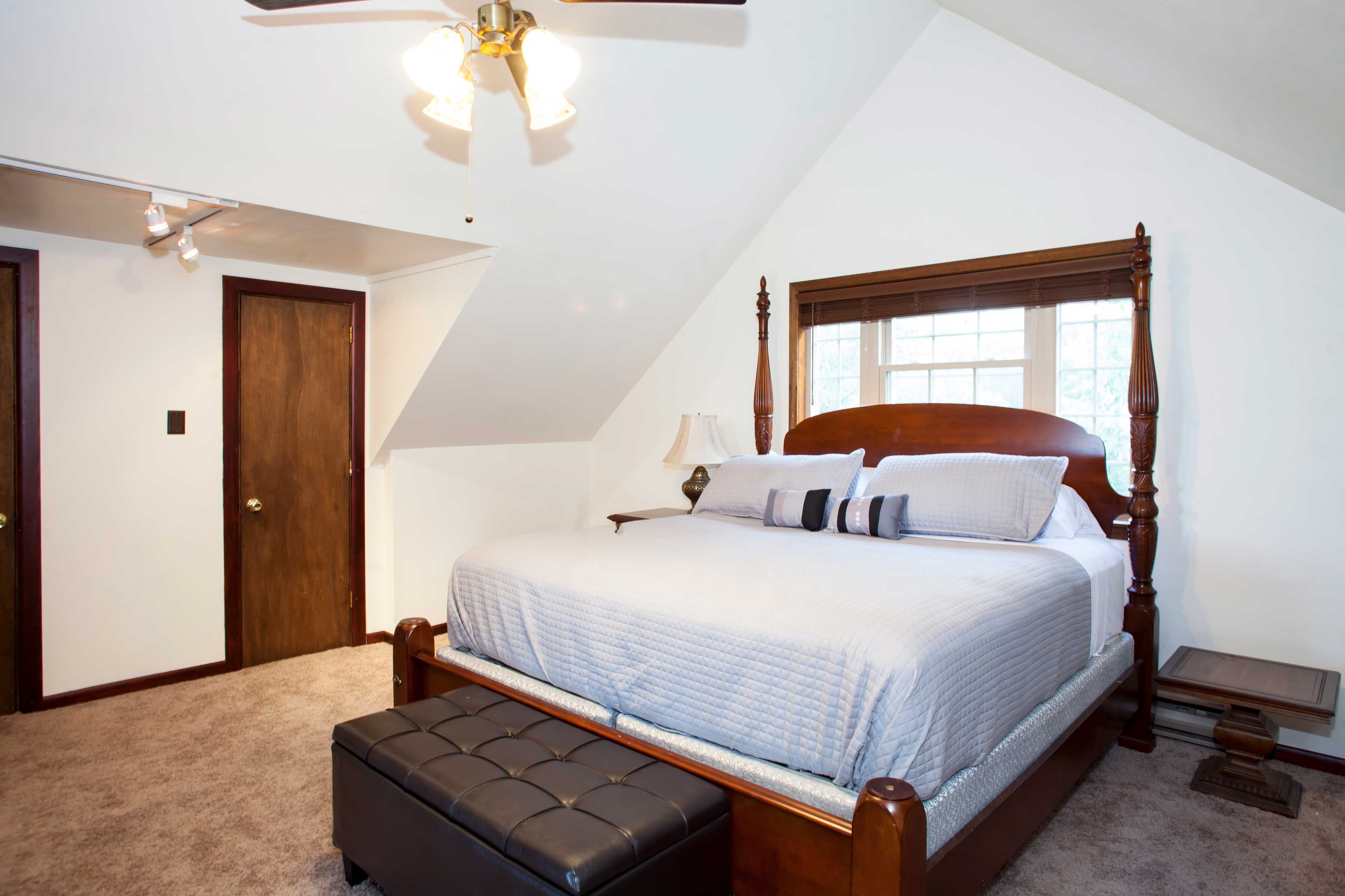 Head up to this bedroom, which hosts a king bed.