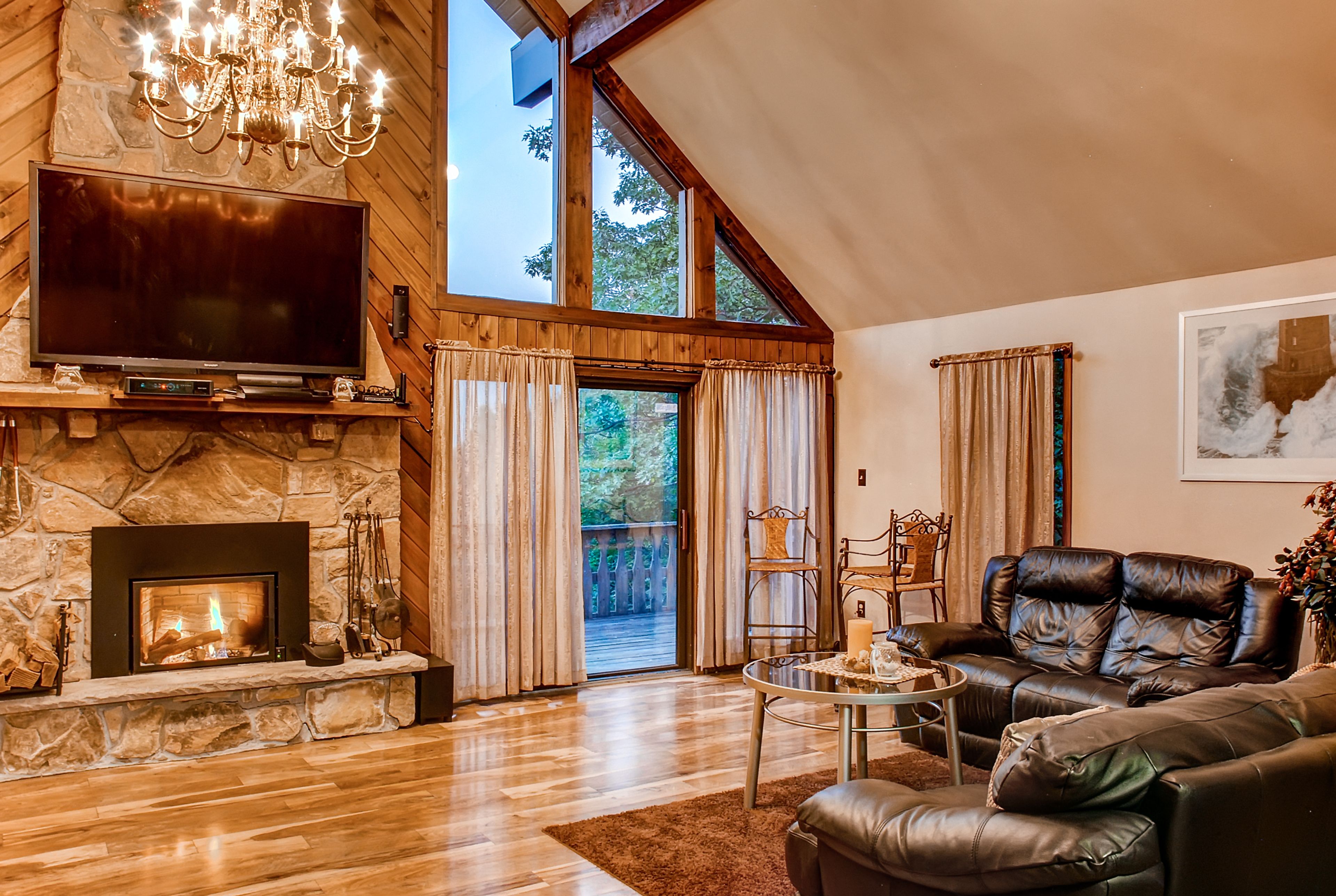 The spacious living area boasts cathedral ceilings.