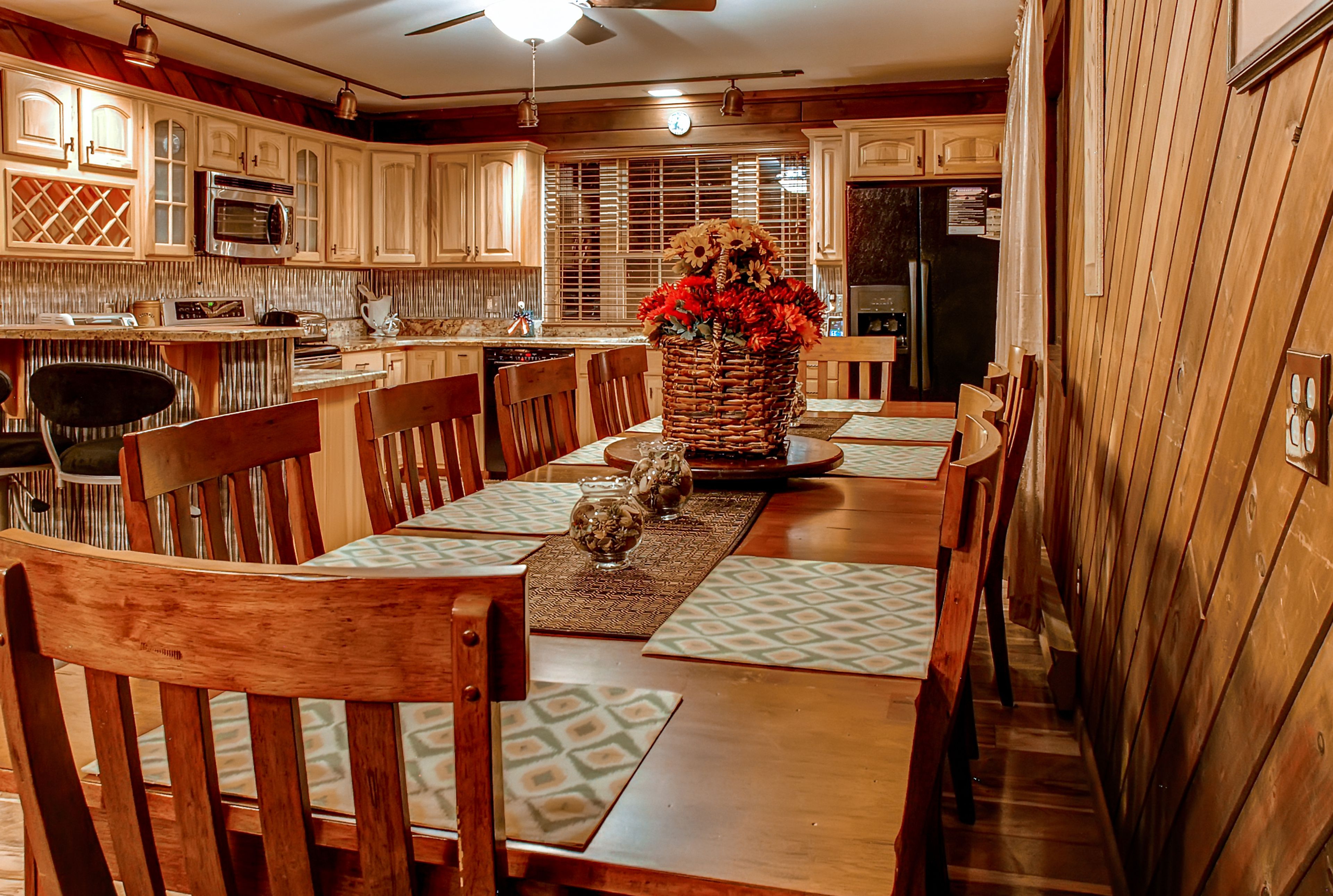 Gather around the dining table to enjoy a home-cooked meal.