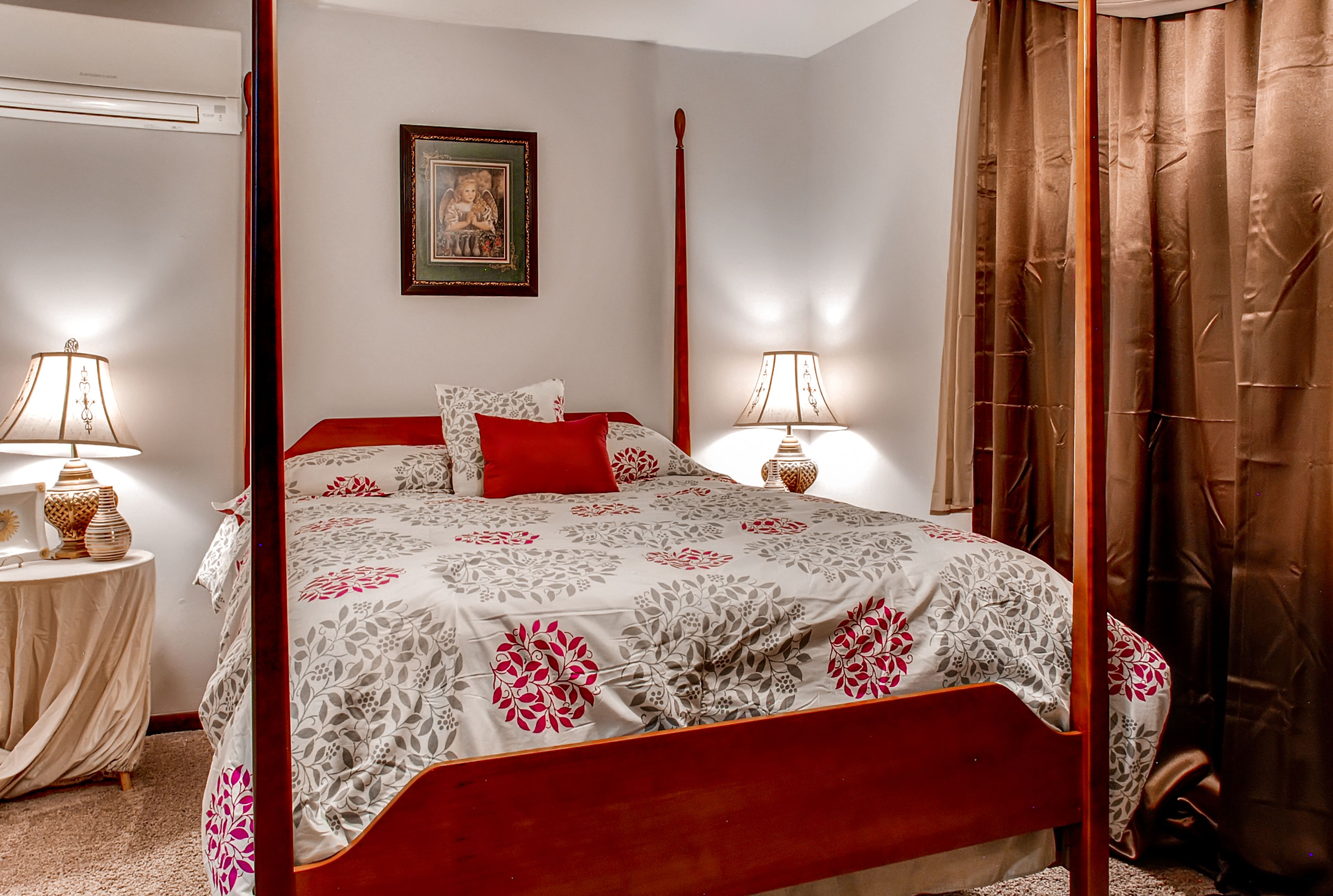 The second bedroom features a queen bed.