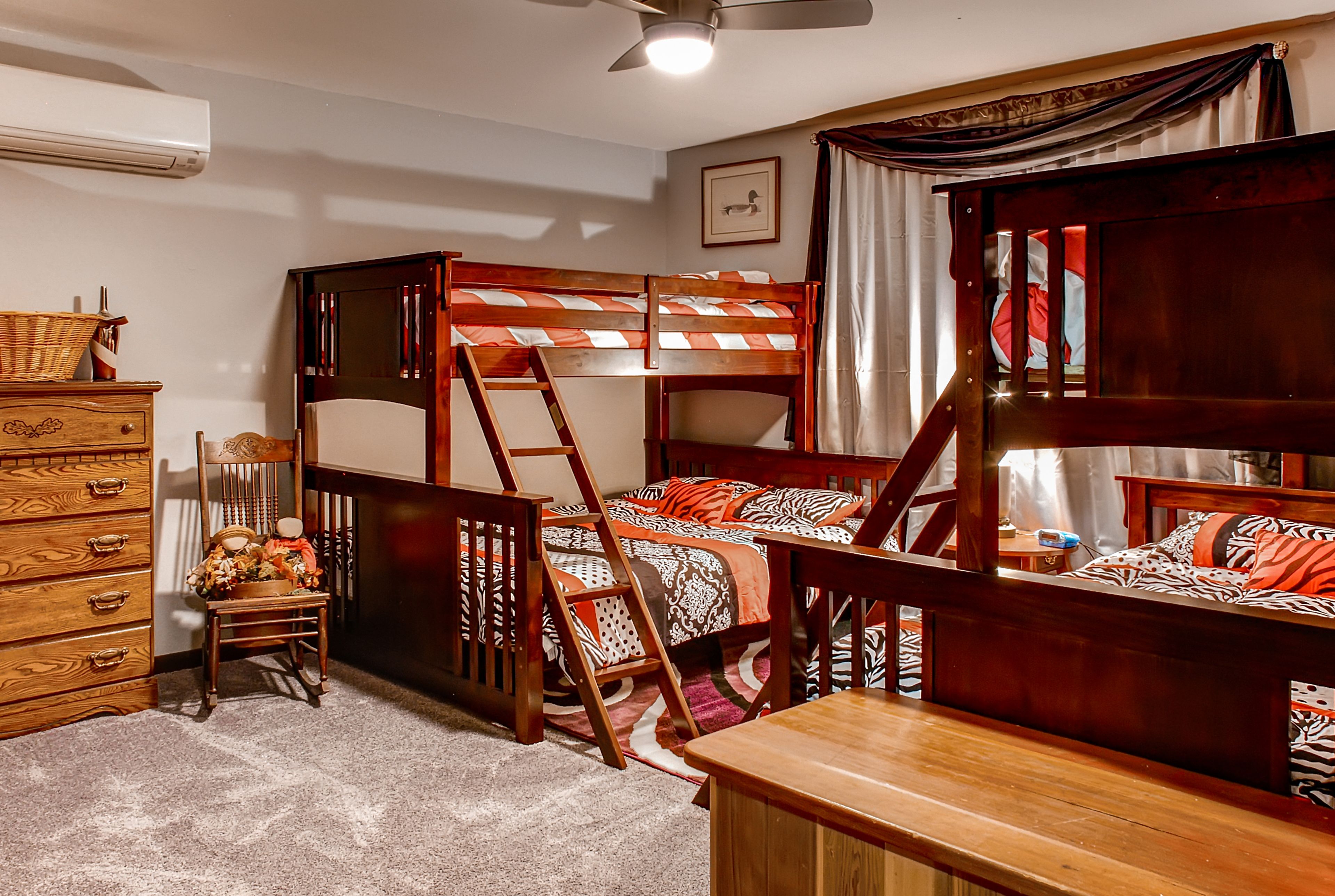 Kids will like the set of twin-over-queen bunk beds in the third bedroom.