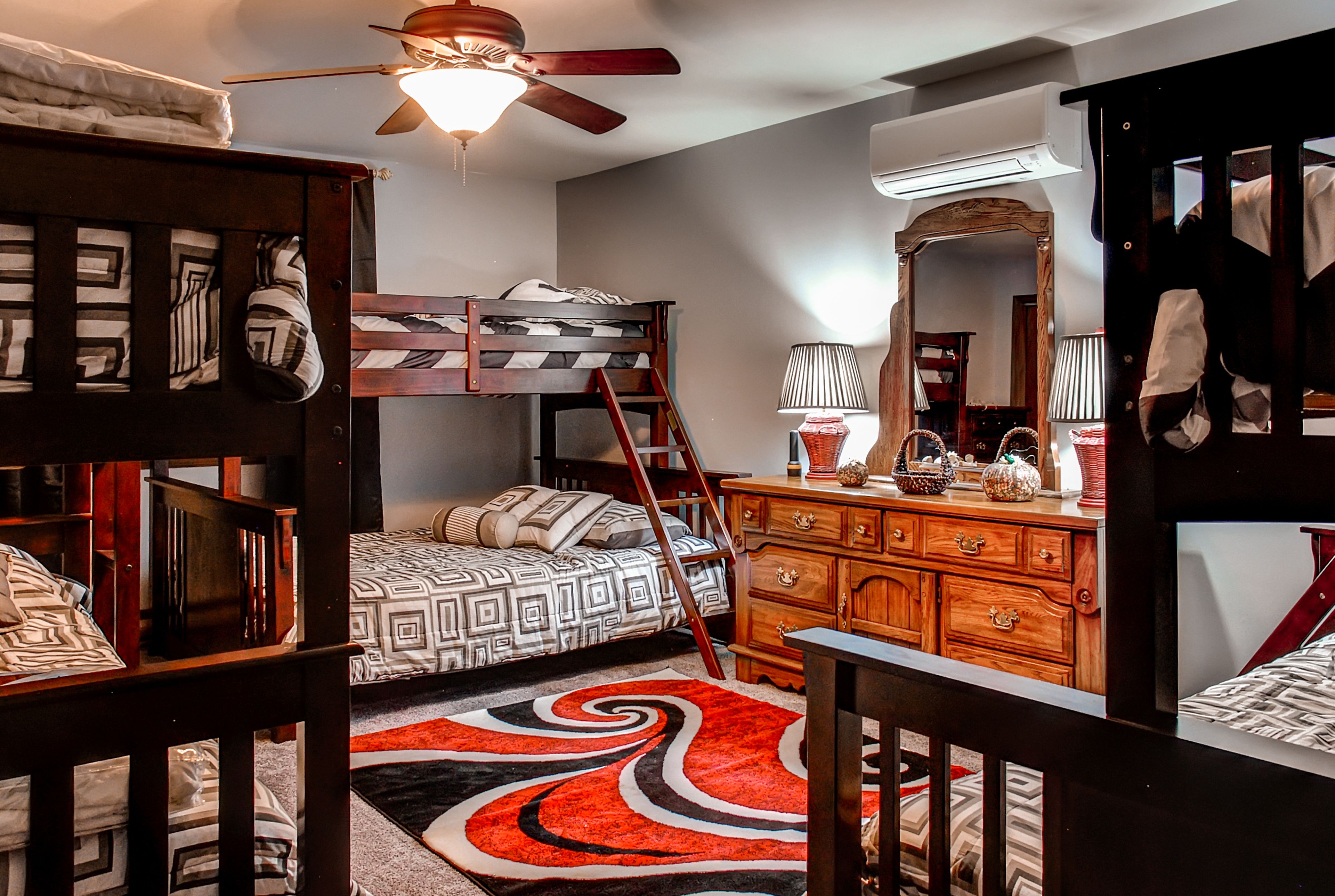 The fourth bedroom also has 2 twin-over-queen bunk beds.