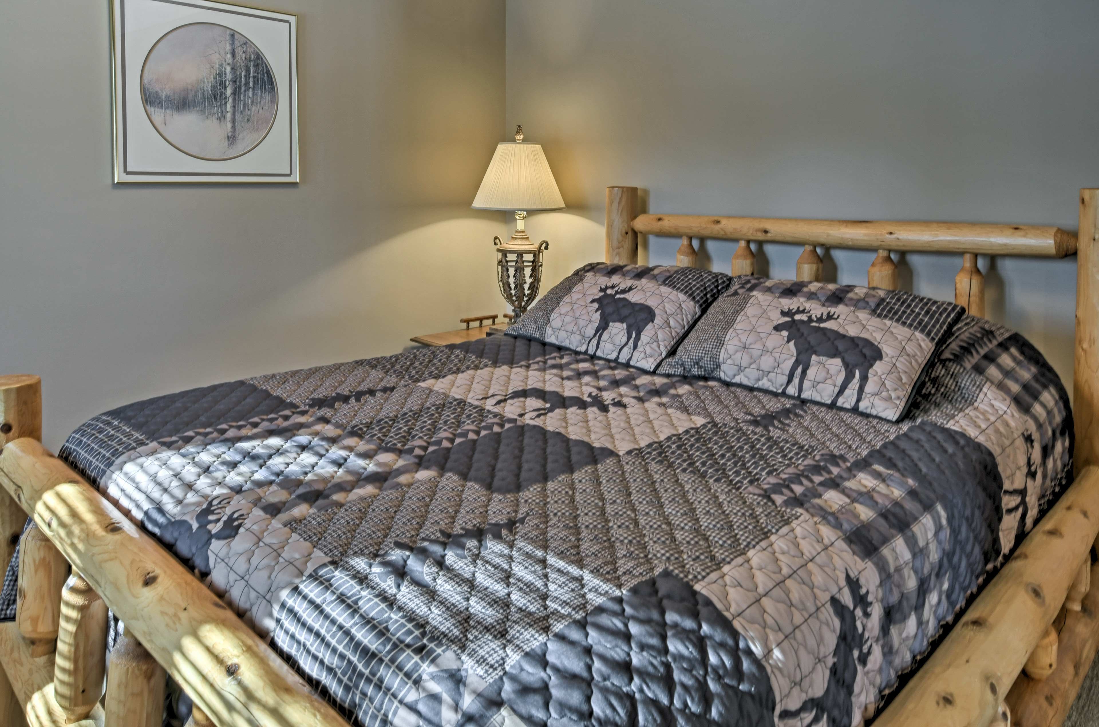 Find a cozy bedroom, complete with a queen bed, in the basement.