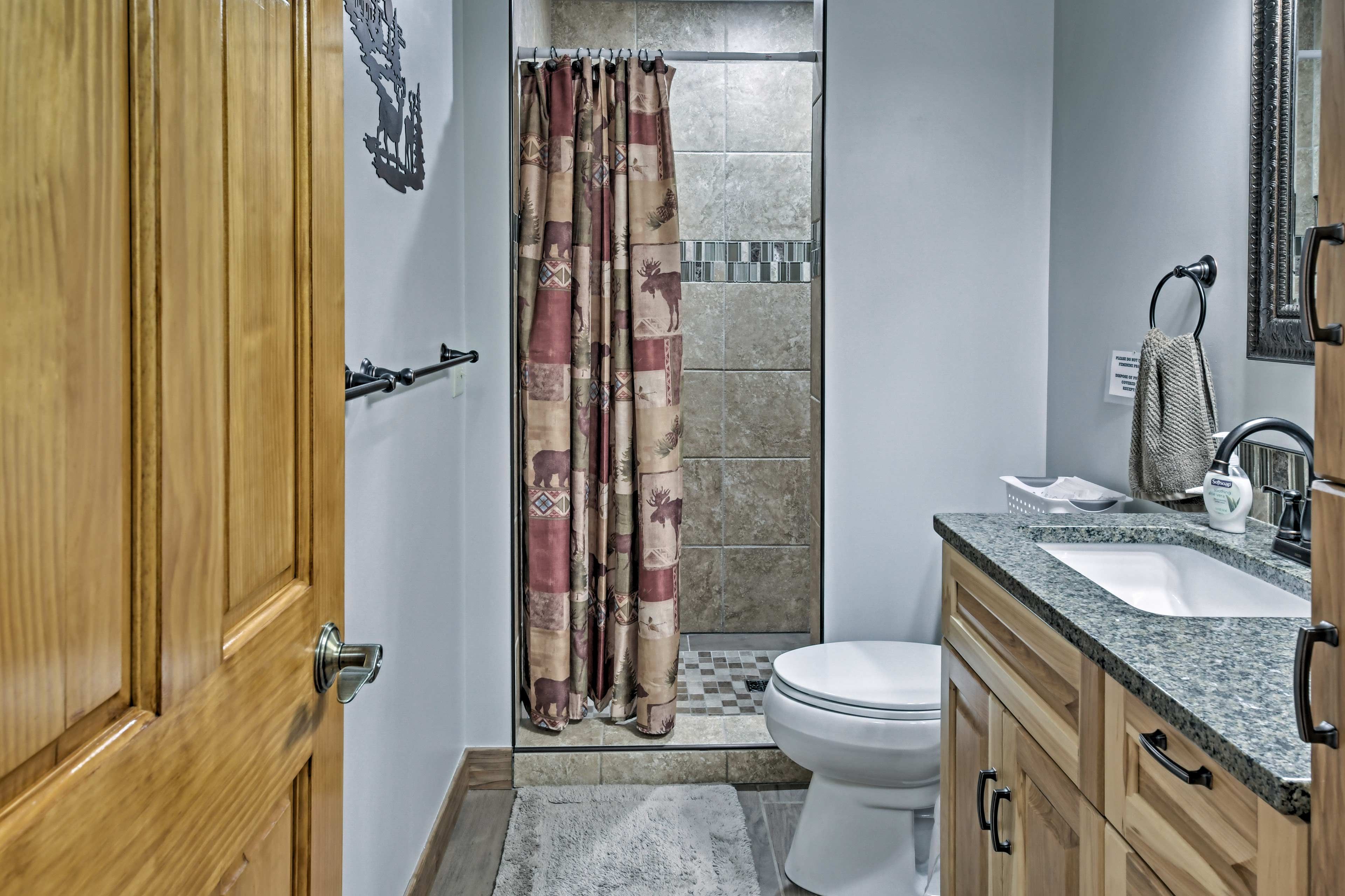 A walk-in shower highlights the bathroom.