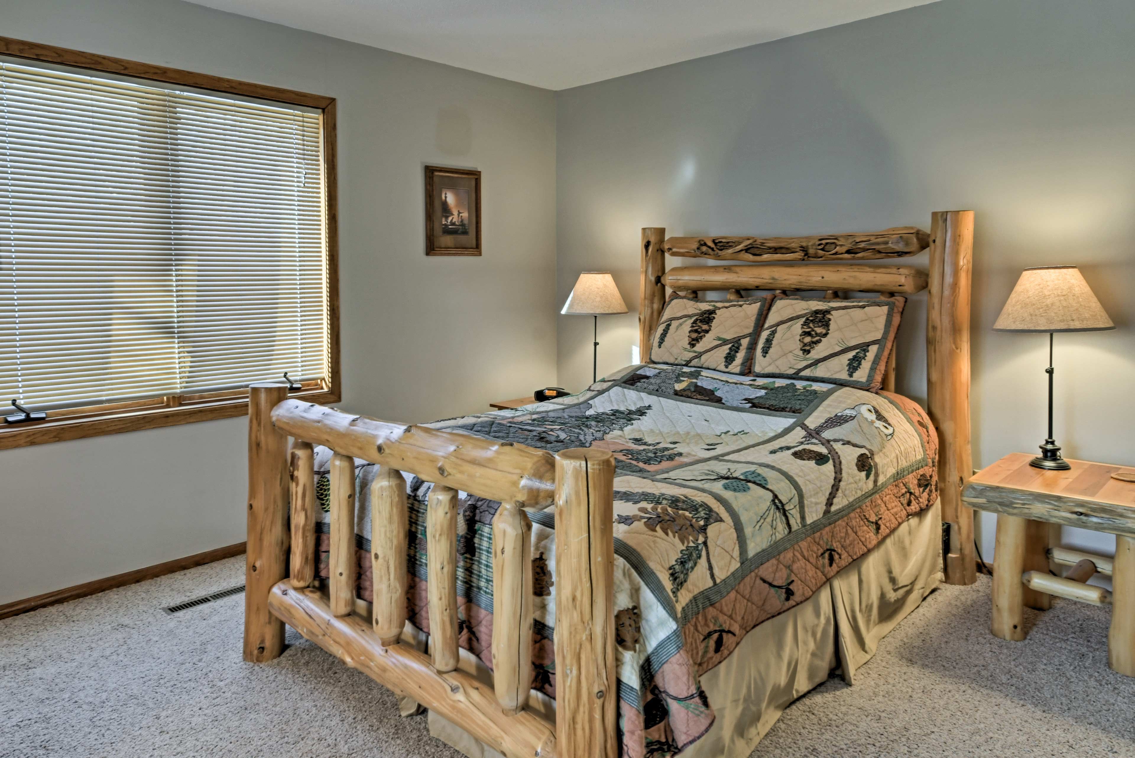 A cloud-like queen bed is sure to gift its guests with peaceful nights of rest.