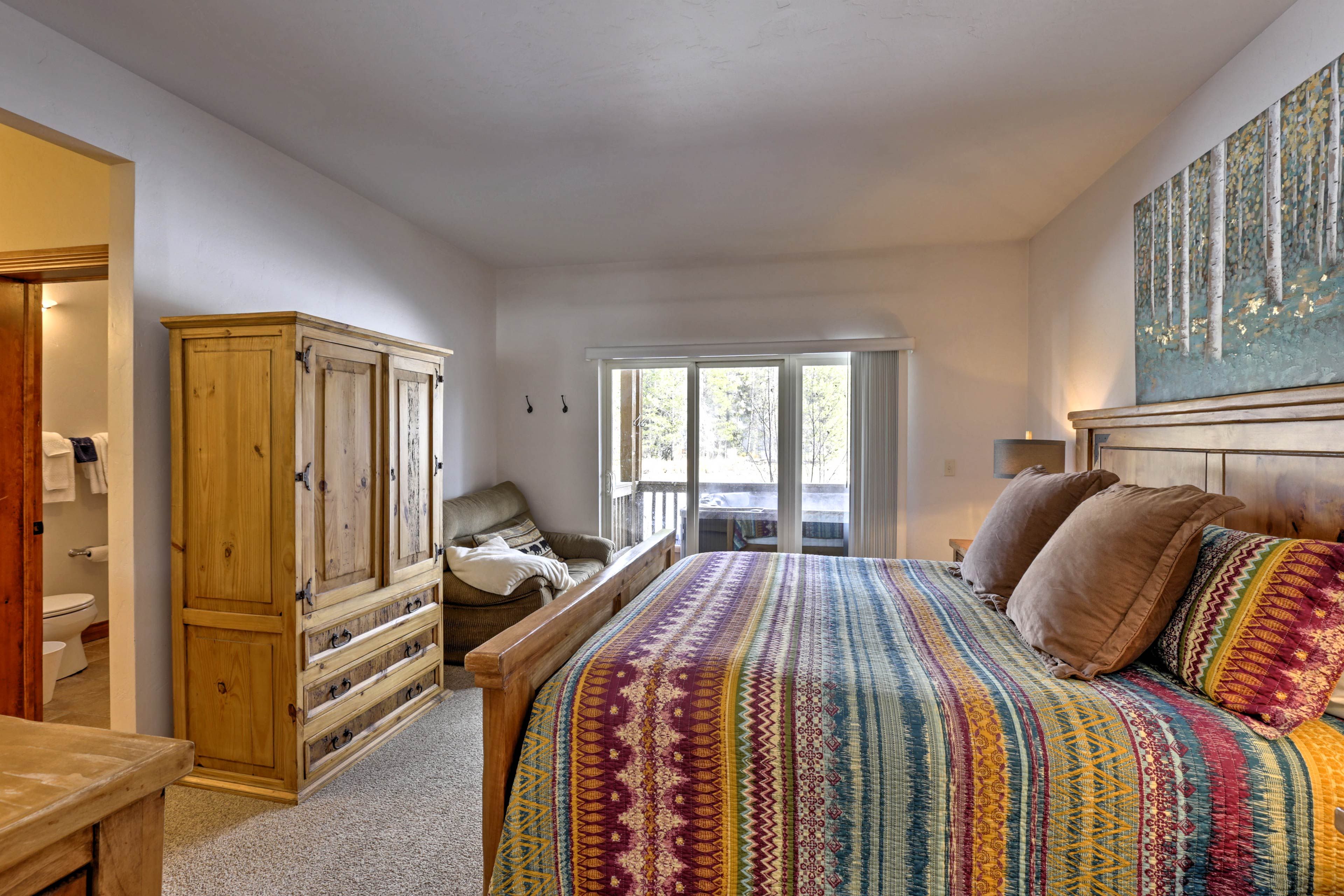The downstairs master bedroom affords plenty of peace and privacy.