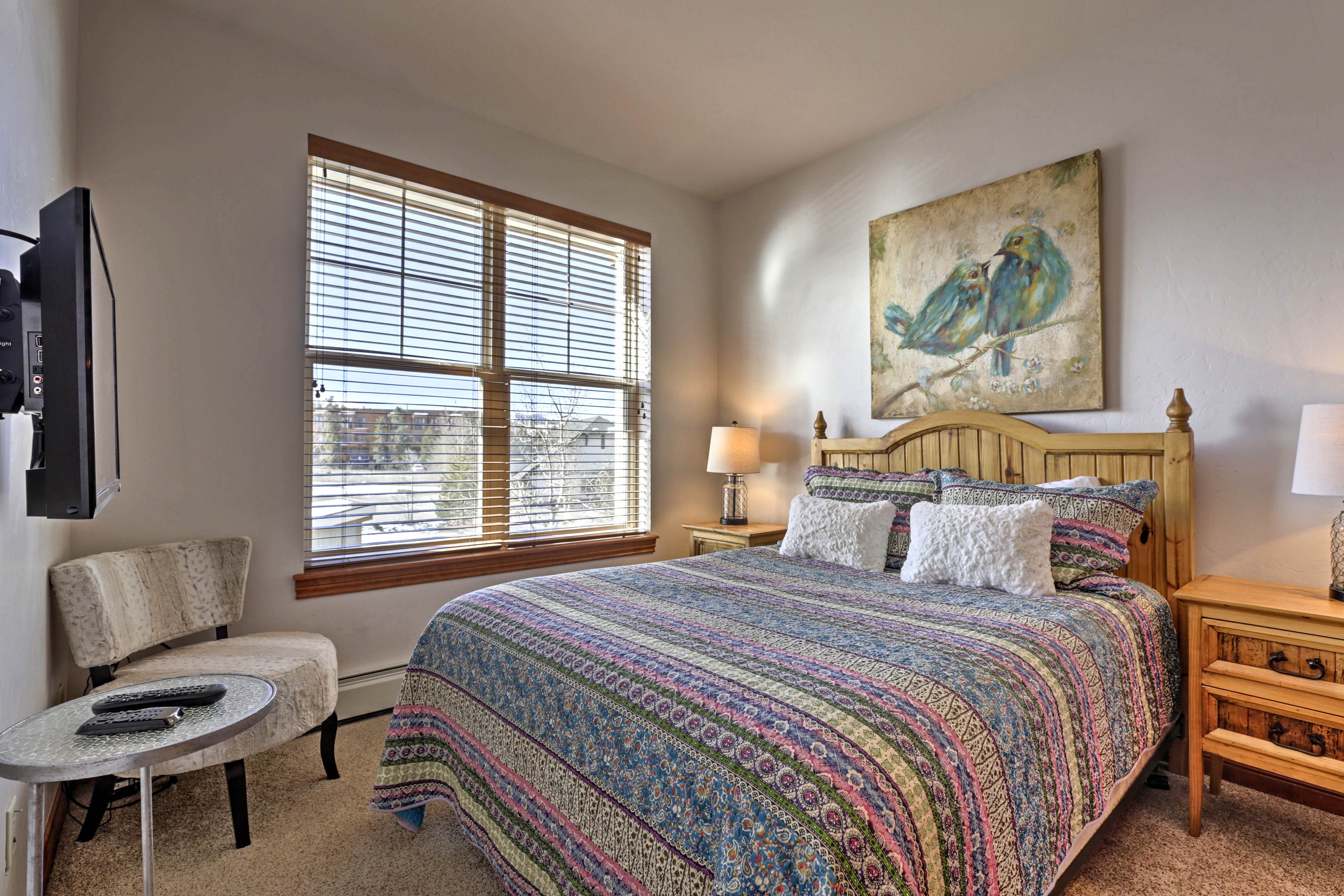 Two can share this bedroom offering a plush queen-sized bed.