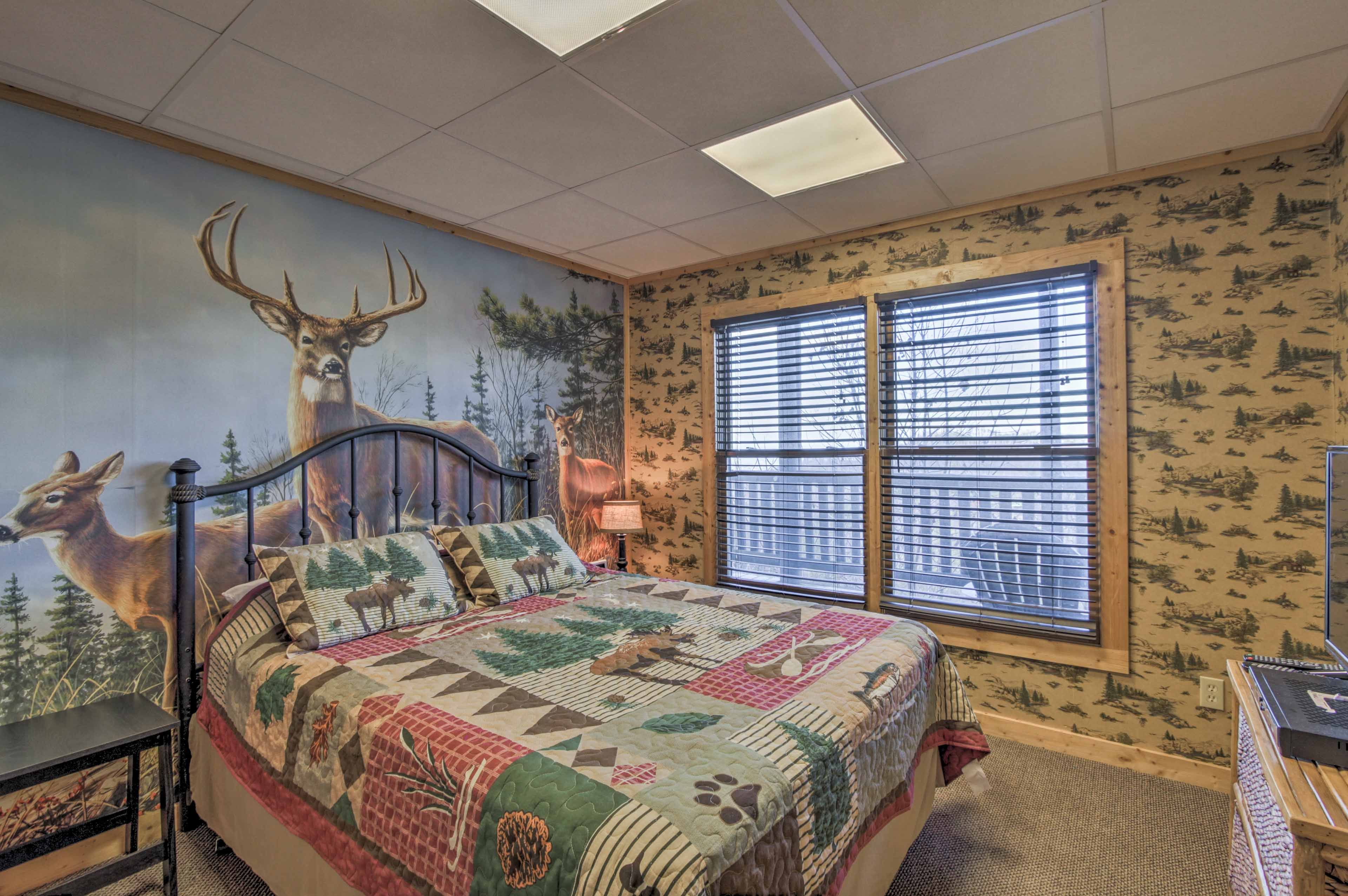 The second-story bedroom has a queen bed.