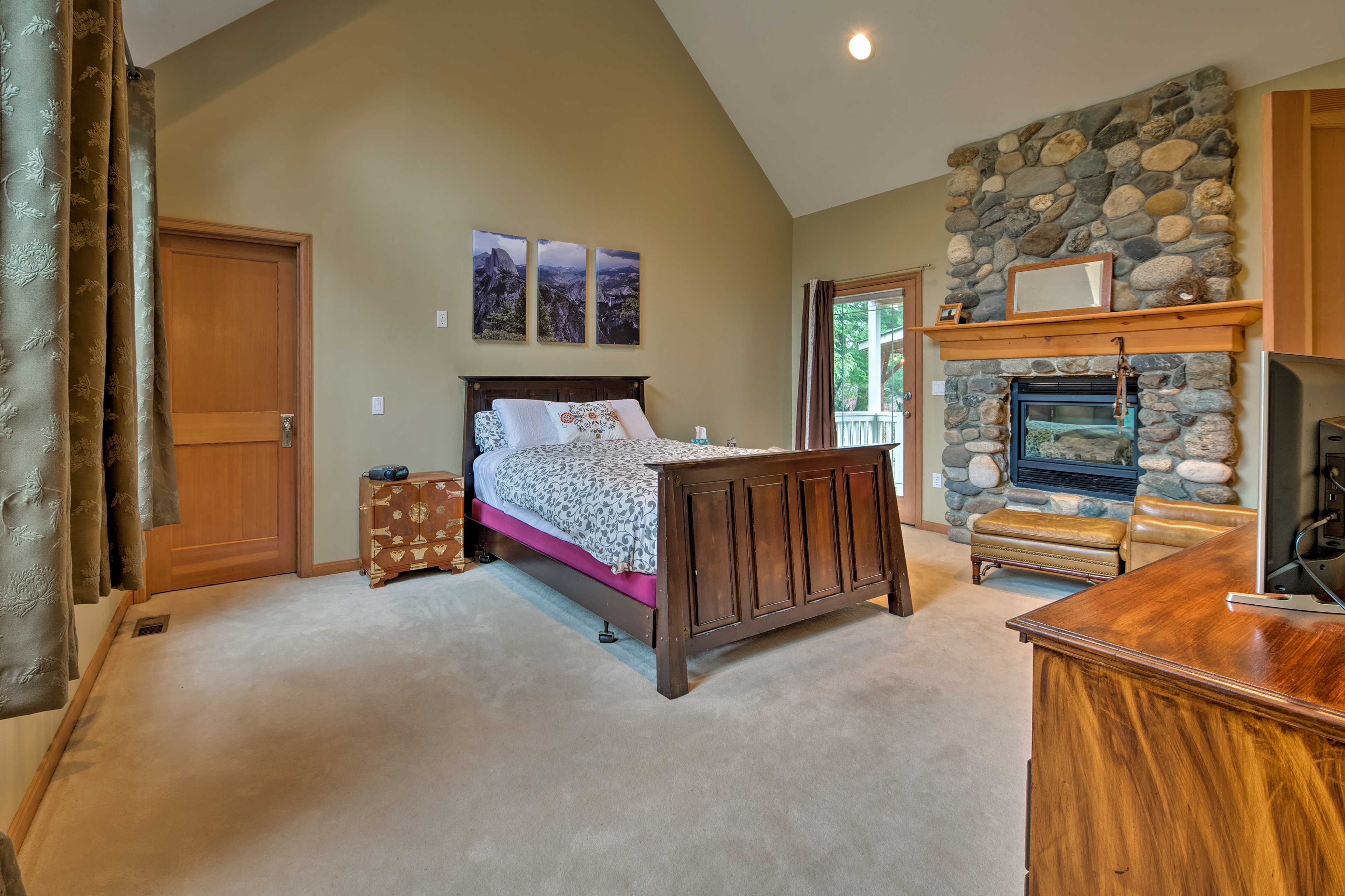 The bedroom suite features a gas fireplace and flat-screen Smart TV.