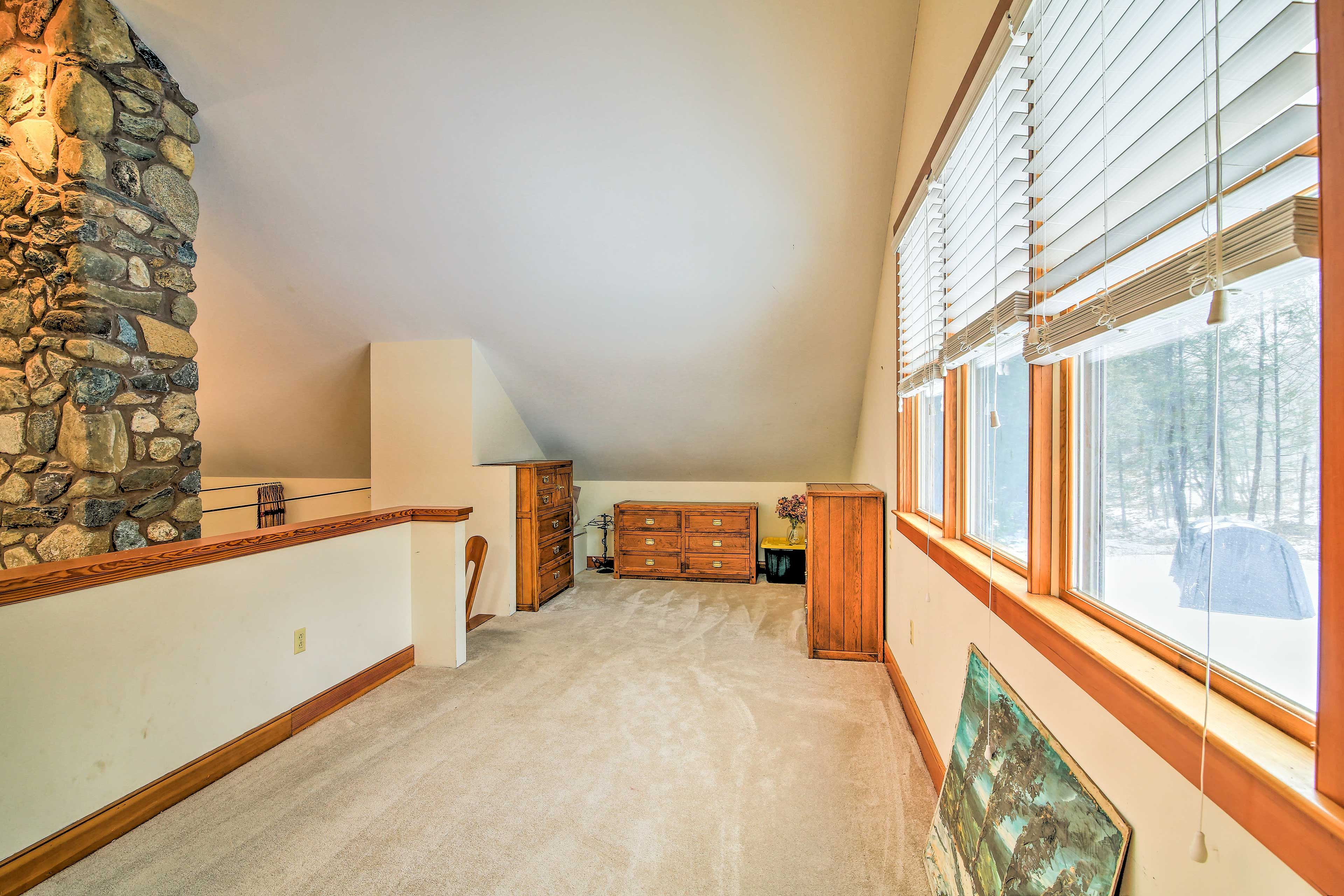 Look out to wooded views from the loft!