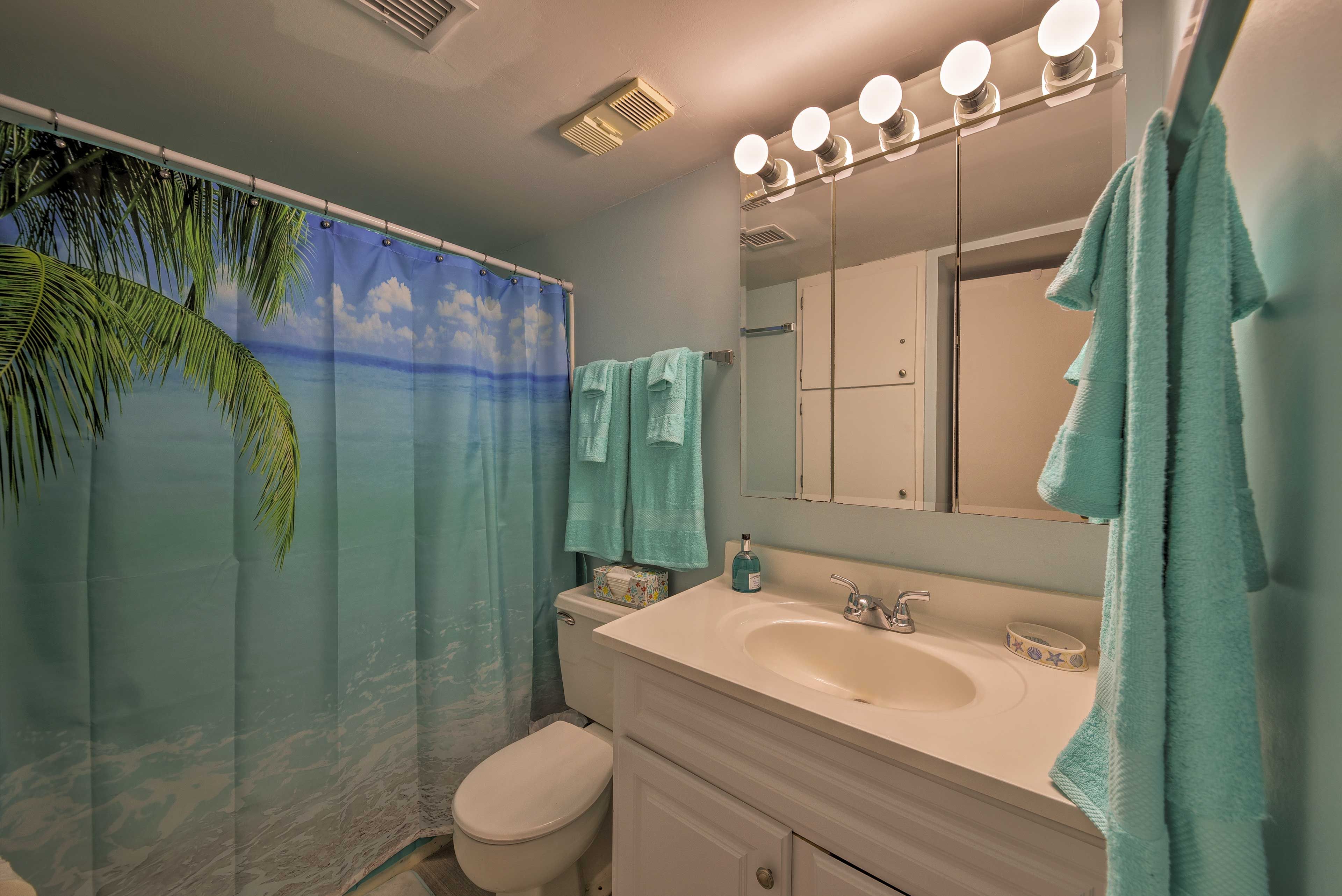 Feel free to freshen up before dinner in this pristine bathroom.