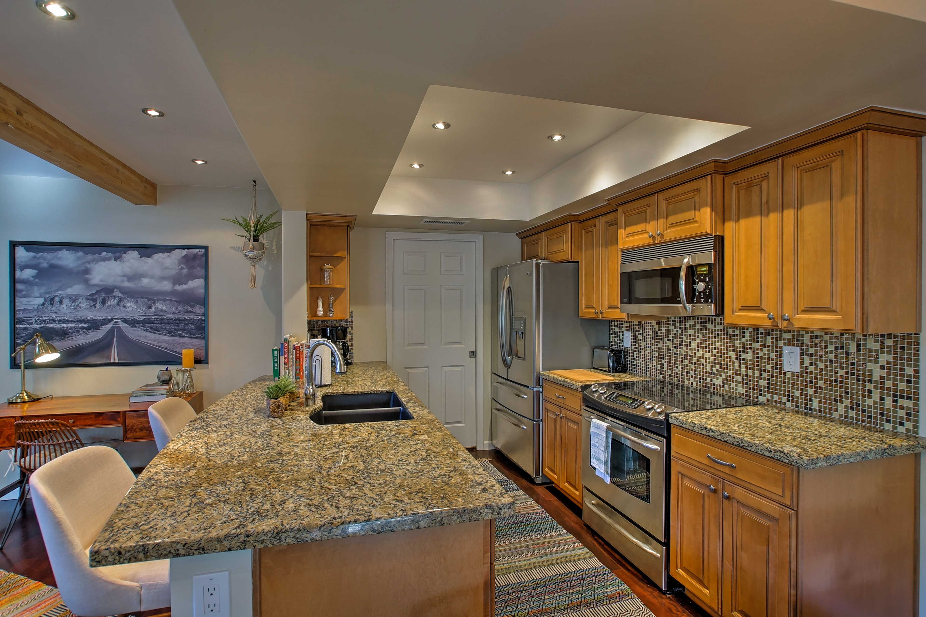 The fully equipped kitchen boasts state-of-the-art appliances.