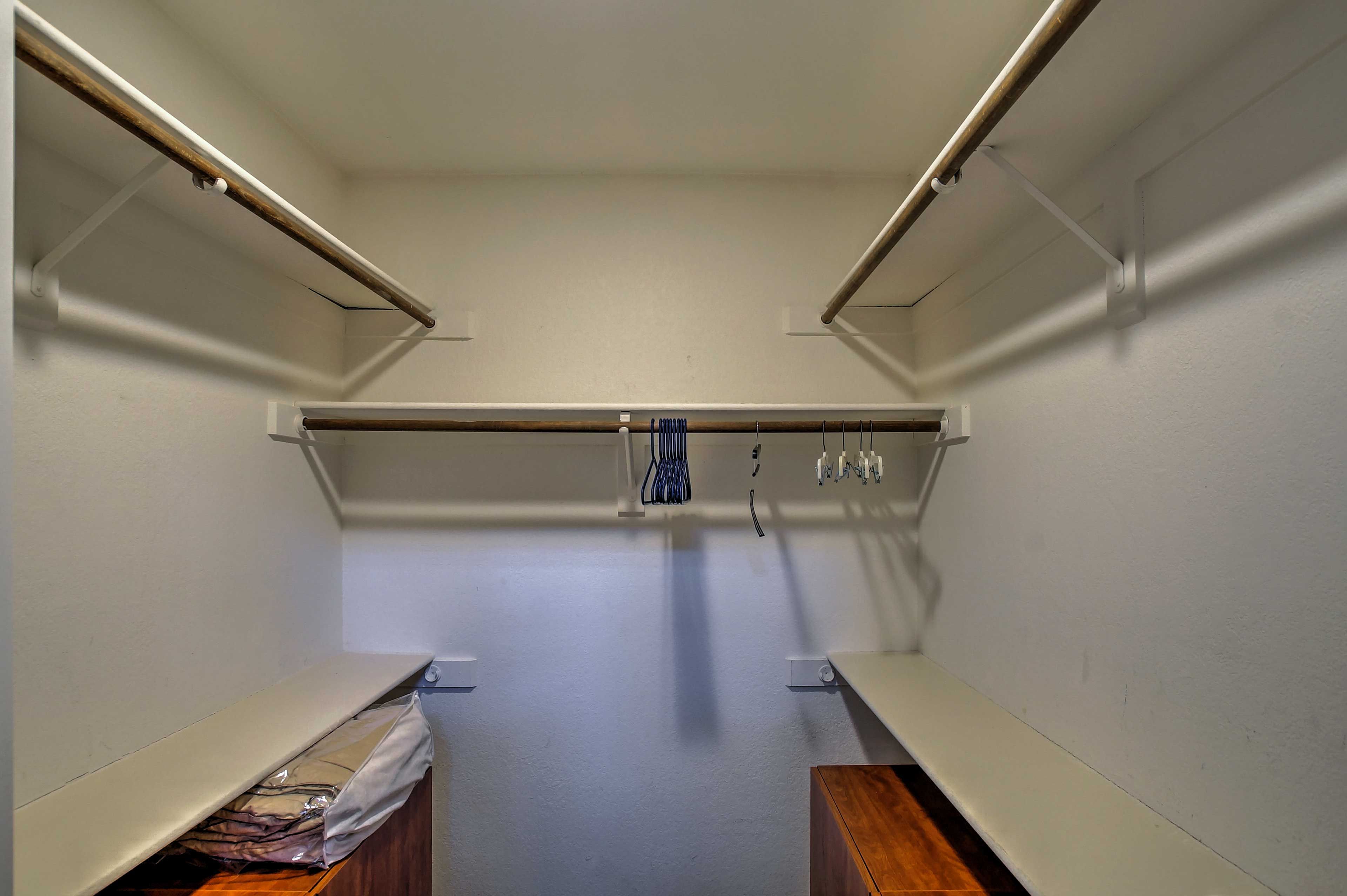 Pack your whole wardrobe as this sizable walk-in closet provides ample space!