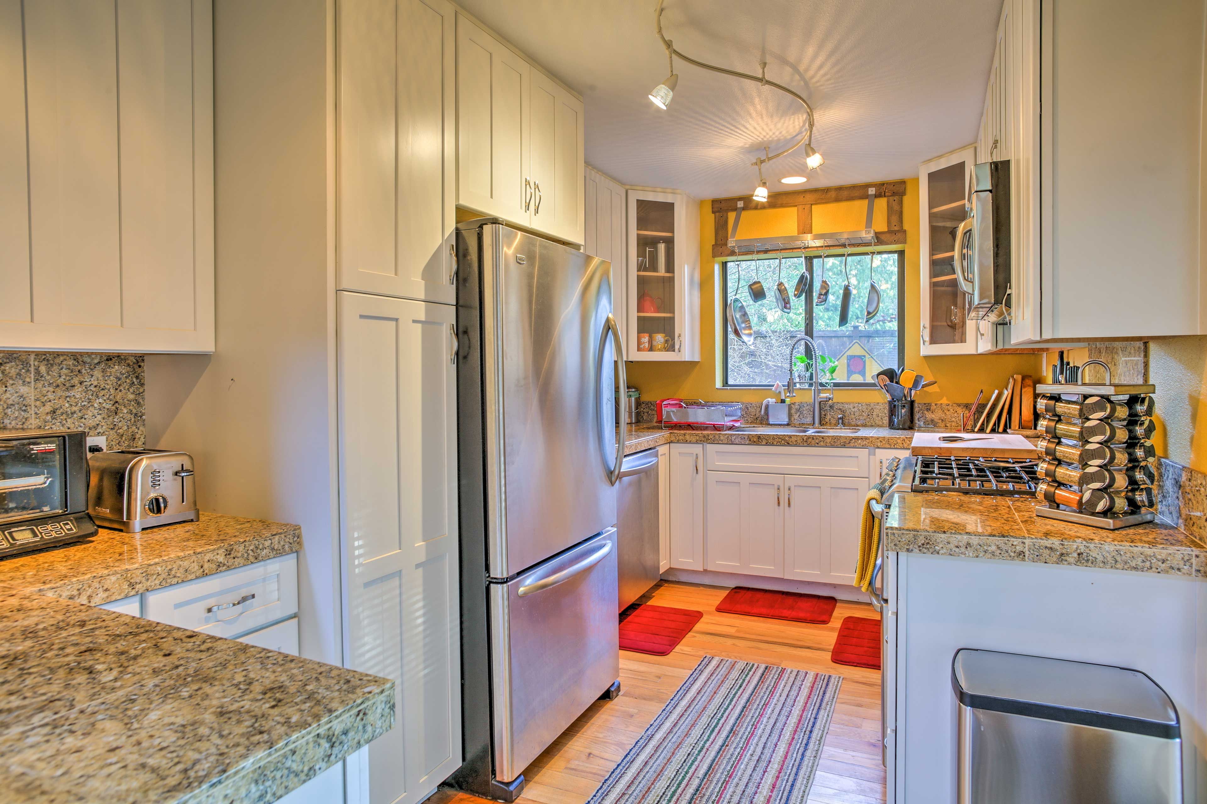 Whip up home-cooked meals with ease in the fully equipped kitchen.