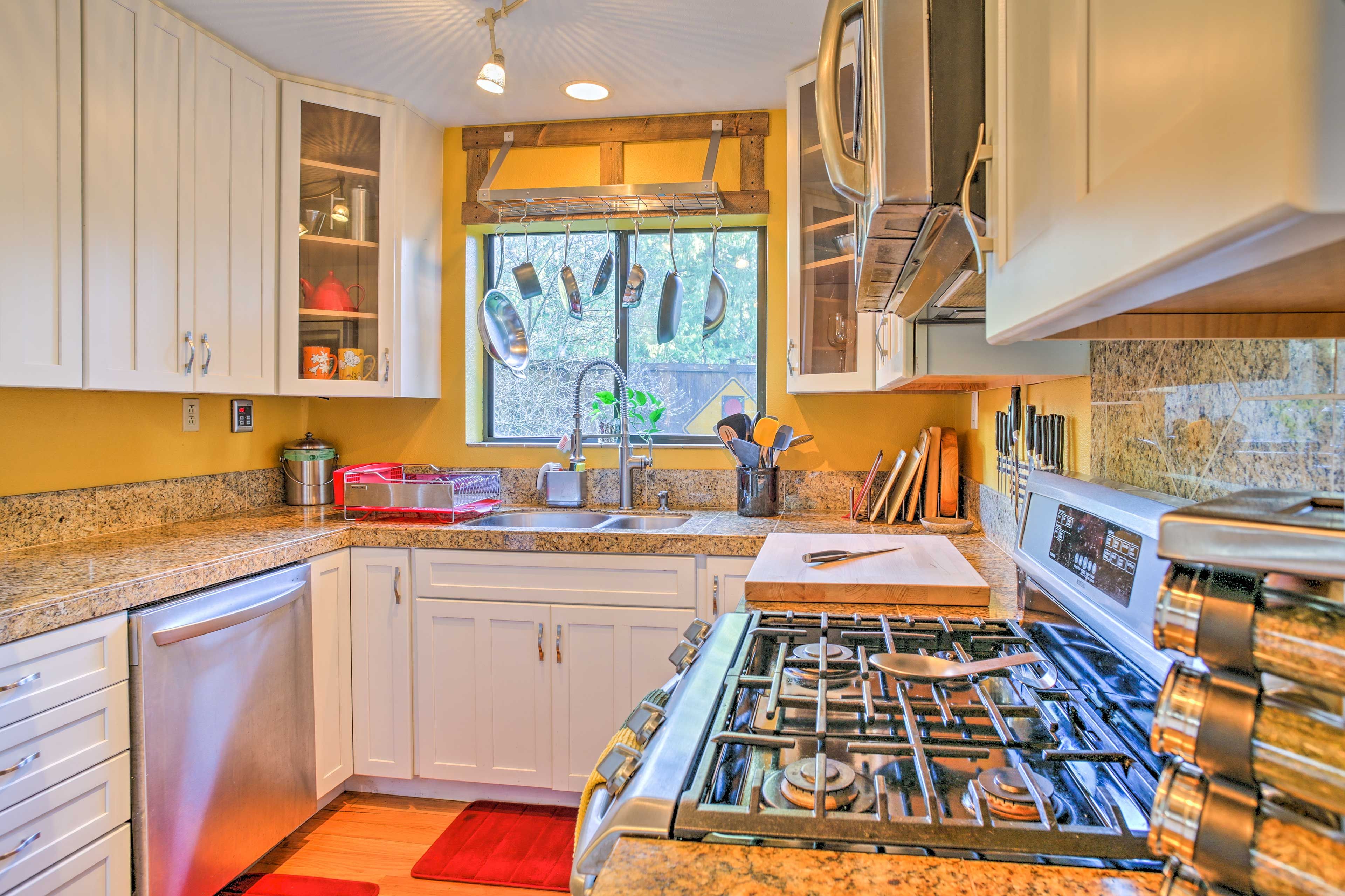 Stainless steel appliances and granite countertops make cooking a breeze.