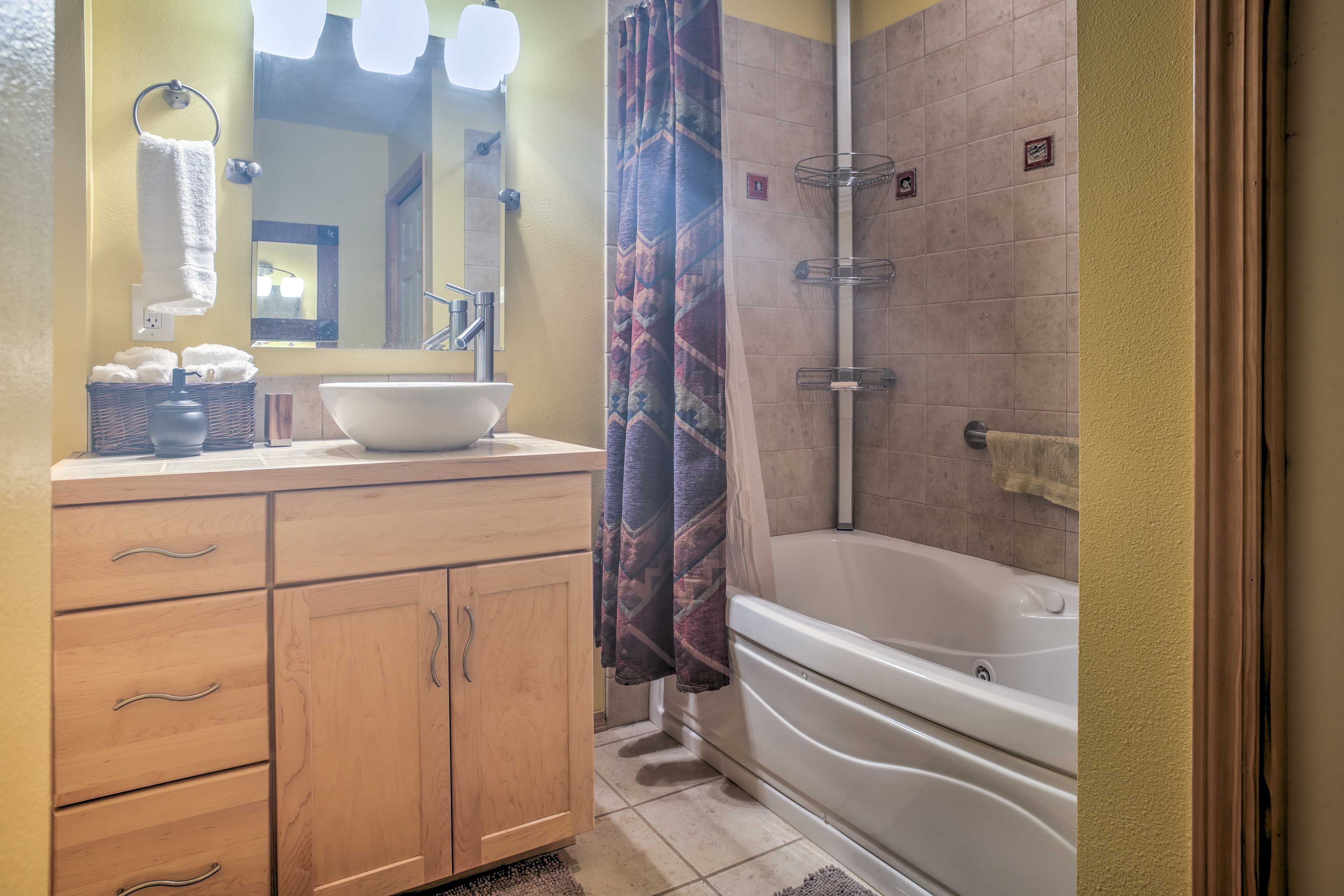 The first-floor bathroom offers a shower/tub combo.