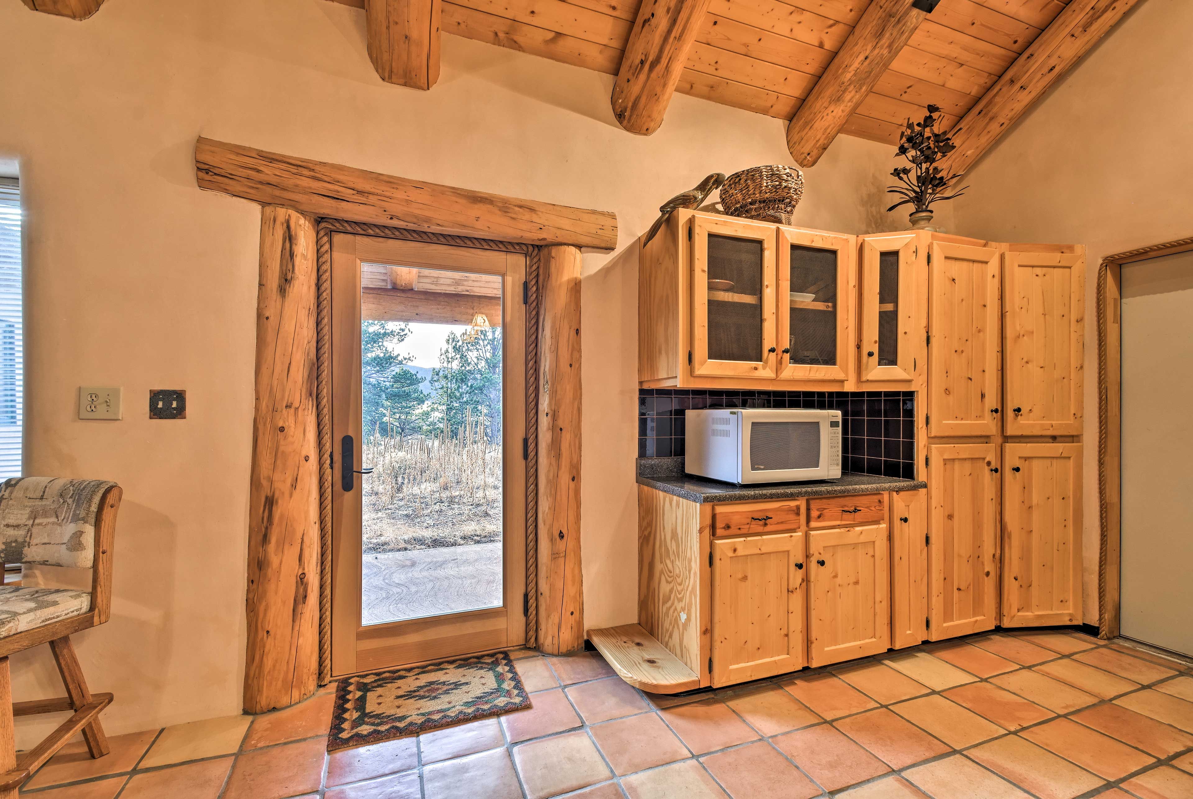 The fully equipped kitchen is ready to help you prepare tasty meals with ease.