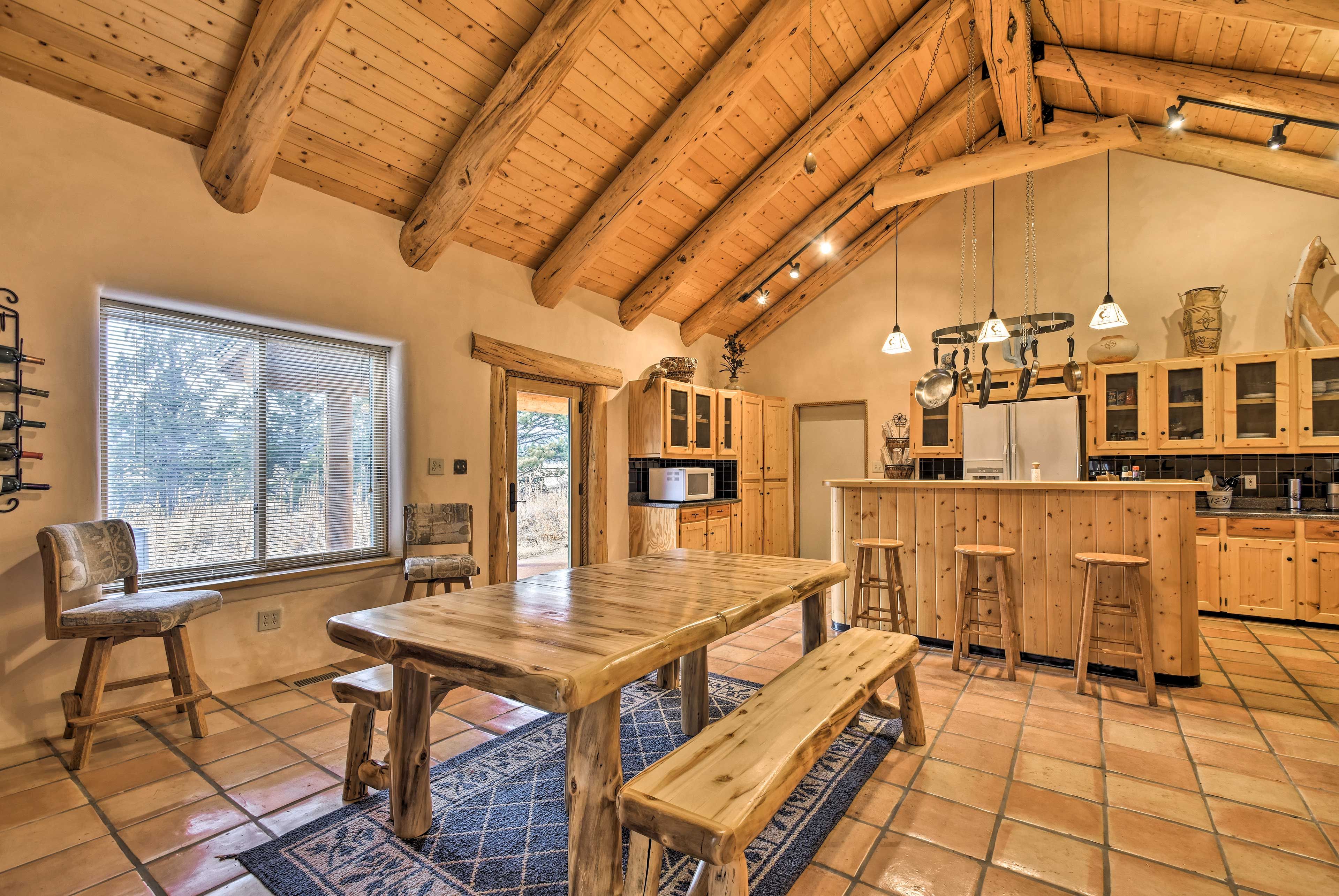 Gather at the handcrafted pine dining table to share the feasts.