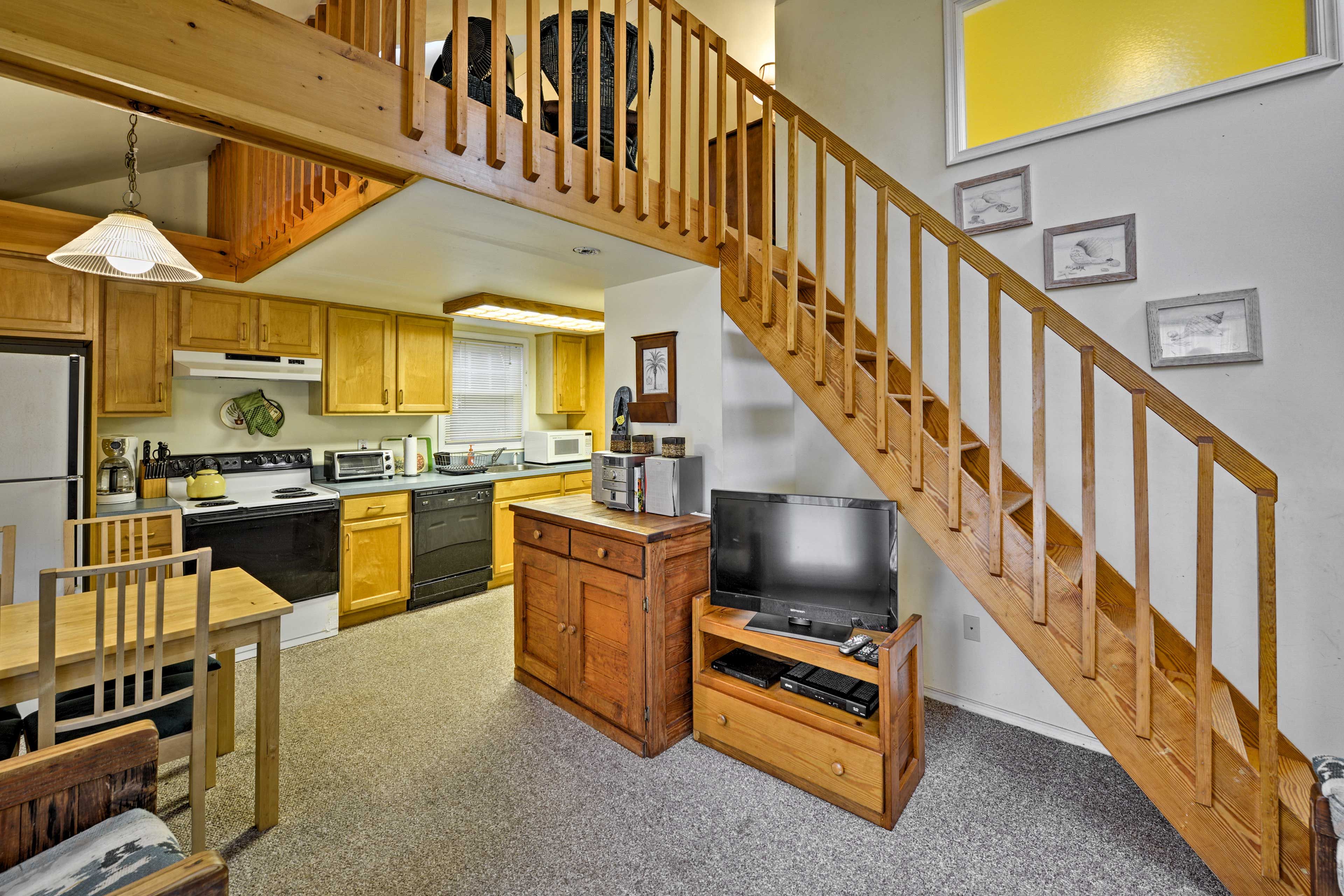 Easily communicate through the open-concept living area of the cottage.