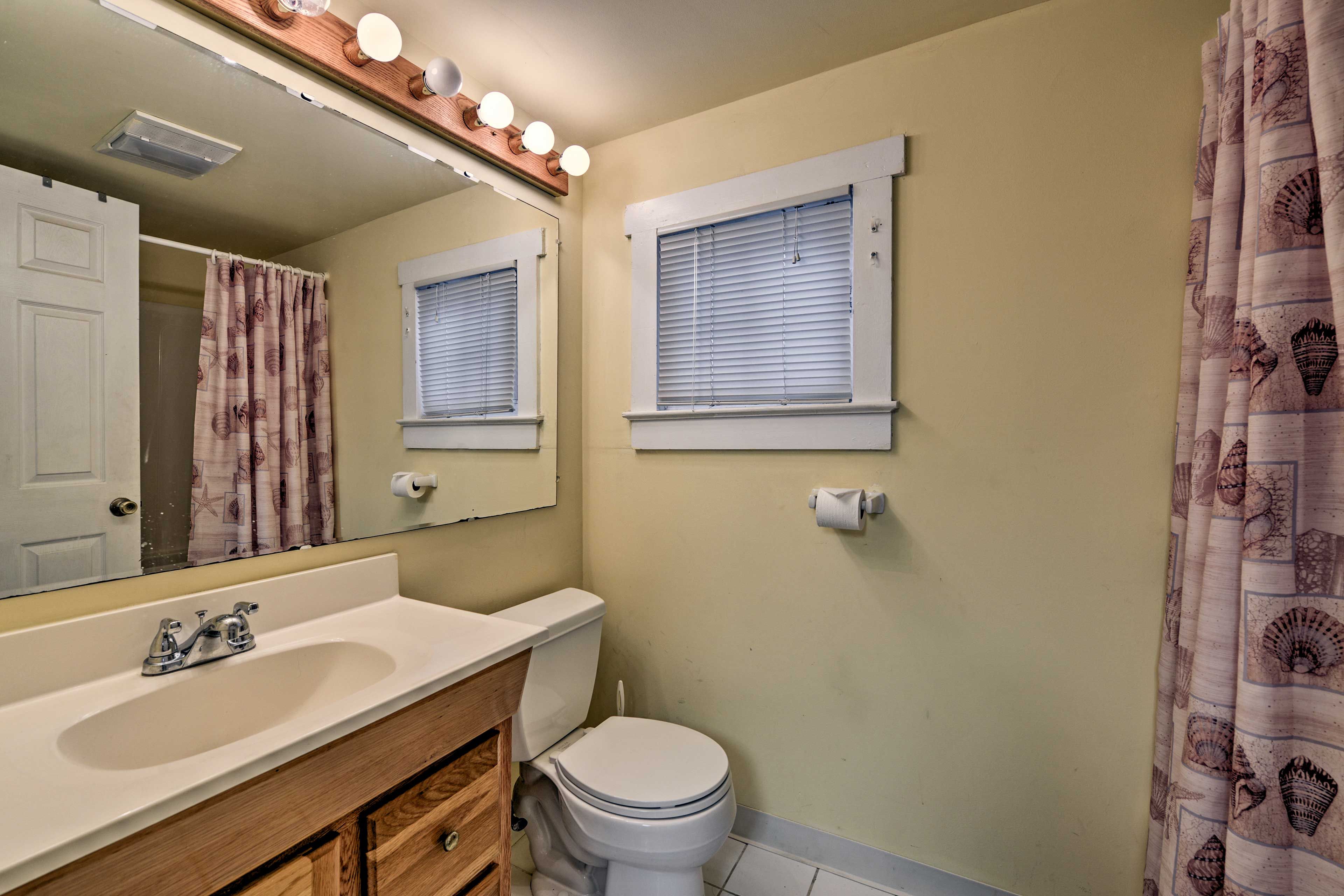 After a day on the beach, shower off in the full bathroom.