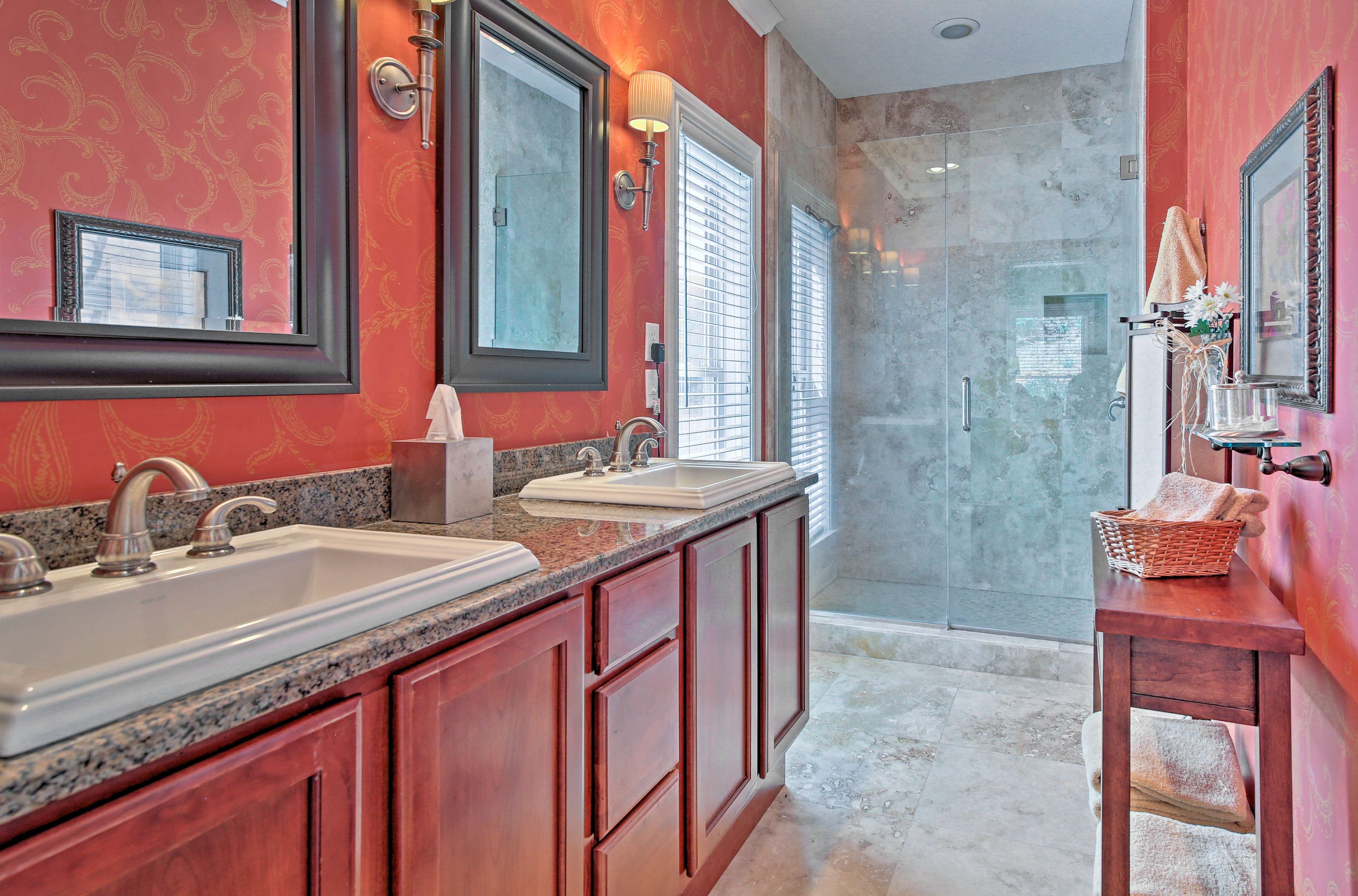This bathroom includes a pristine walk-in shower.