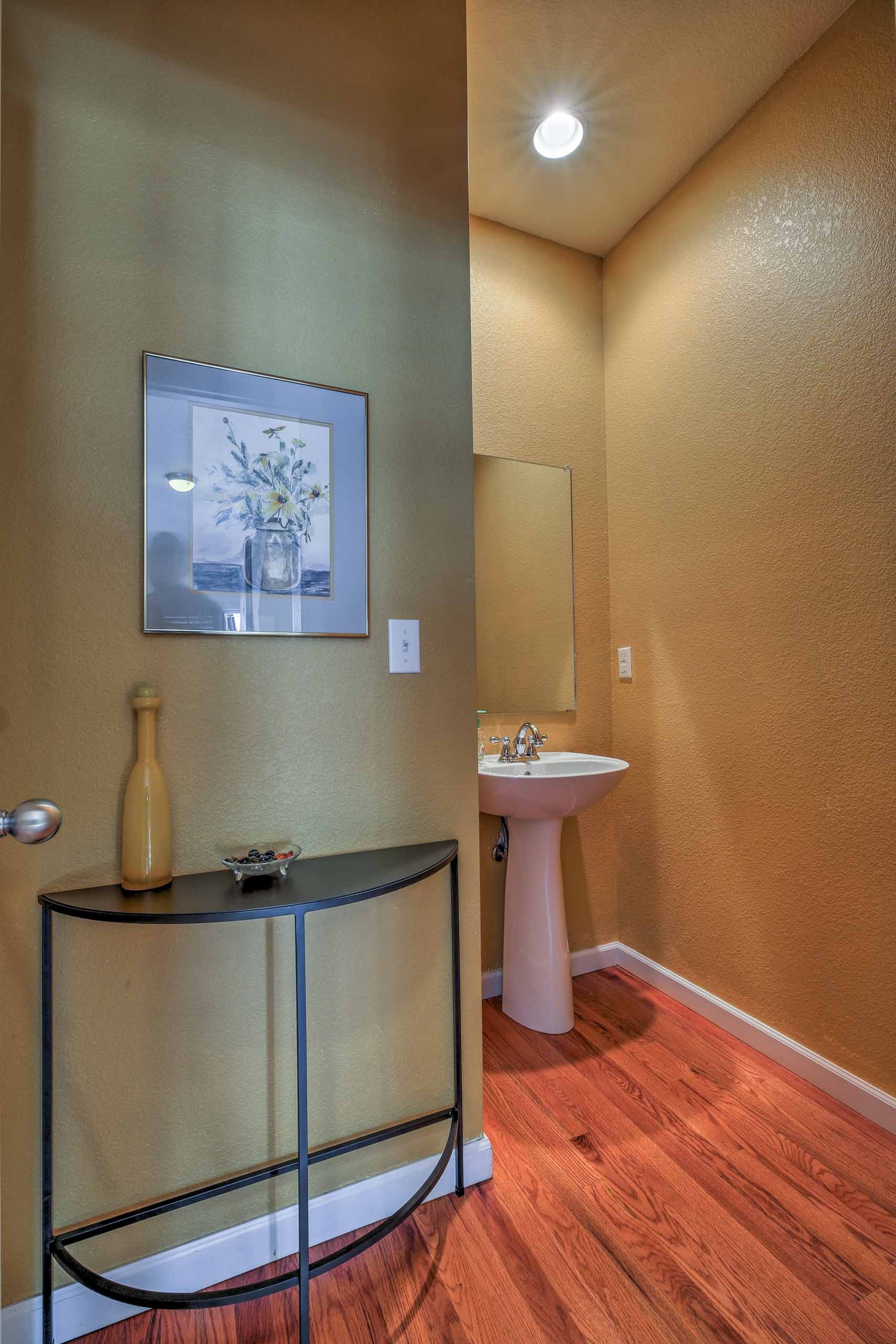 The townhome is equipped with 2 full bathrooms and a half-bath.