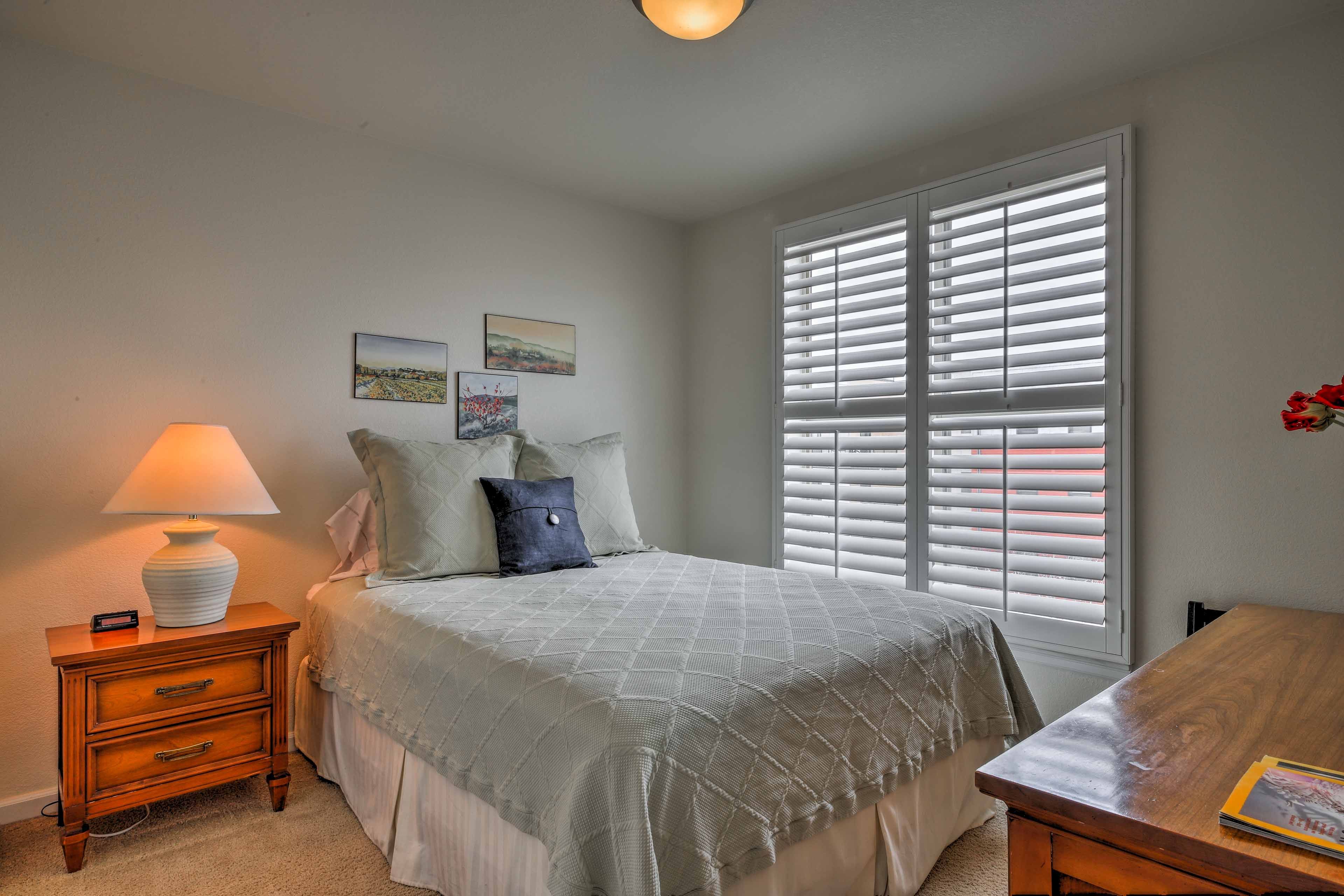 Rest easy on the queen-sized bed in the second bedroom.