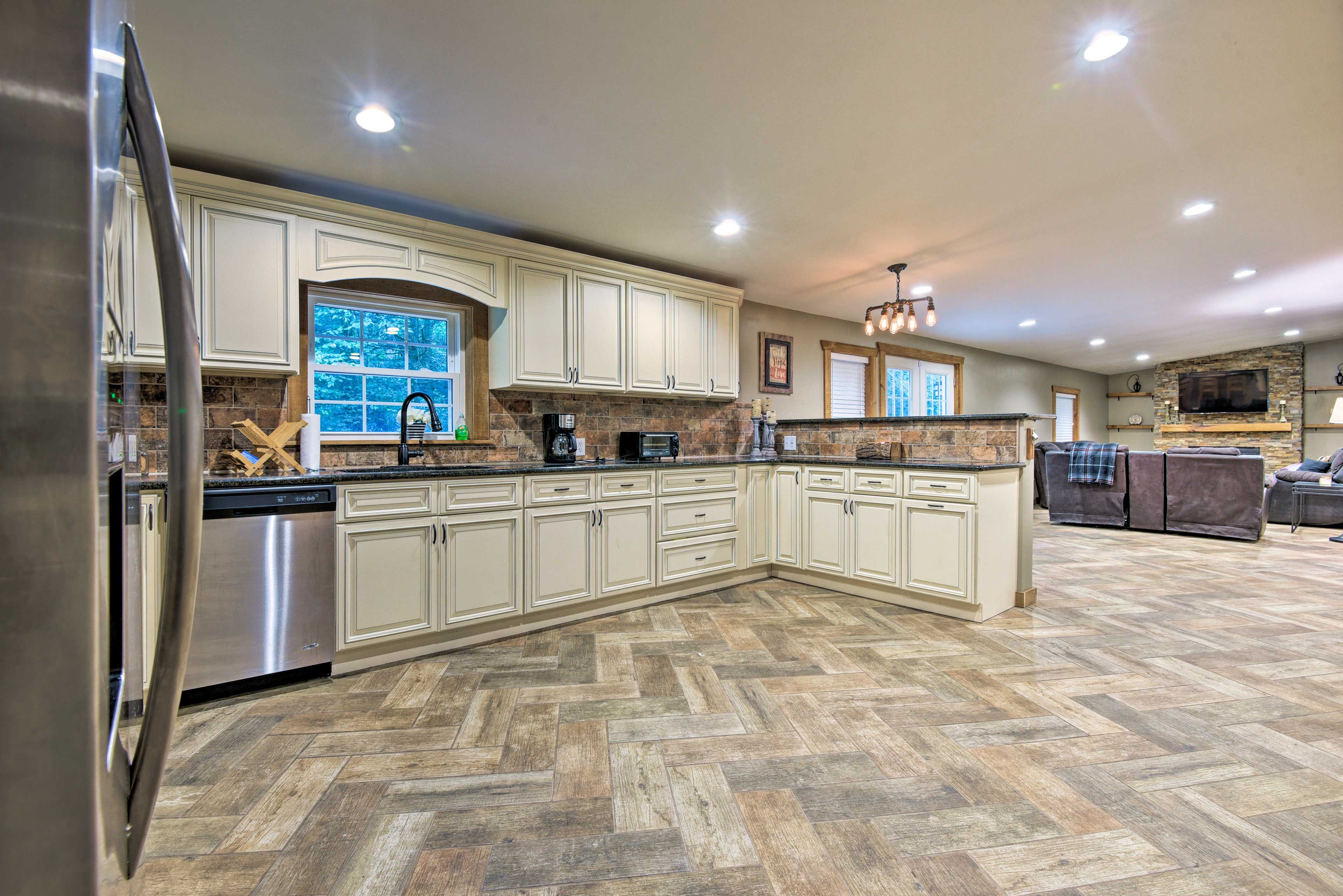 The home has 5 bedrooms, 4 bathrooms, and room to sleep 12 guests in beds.