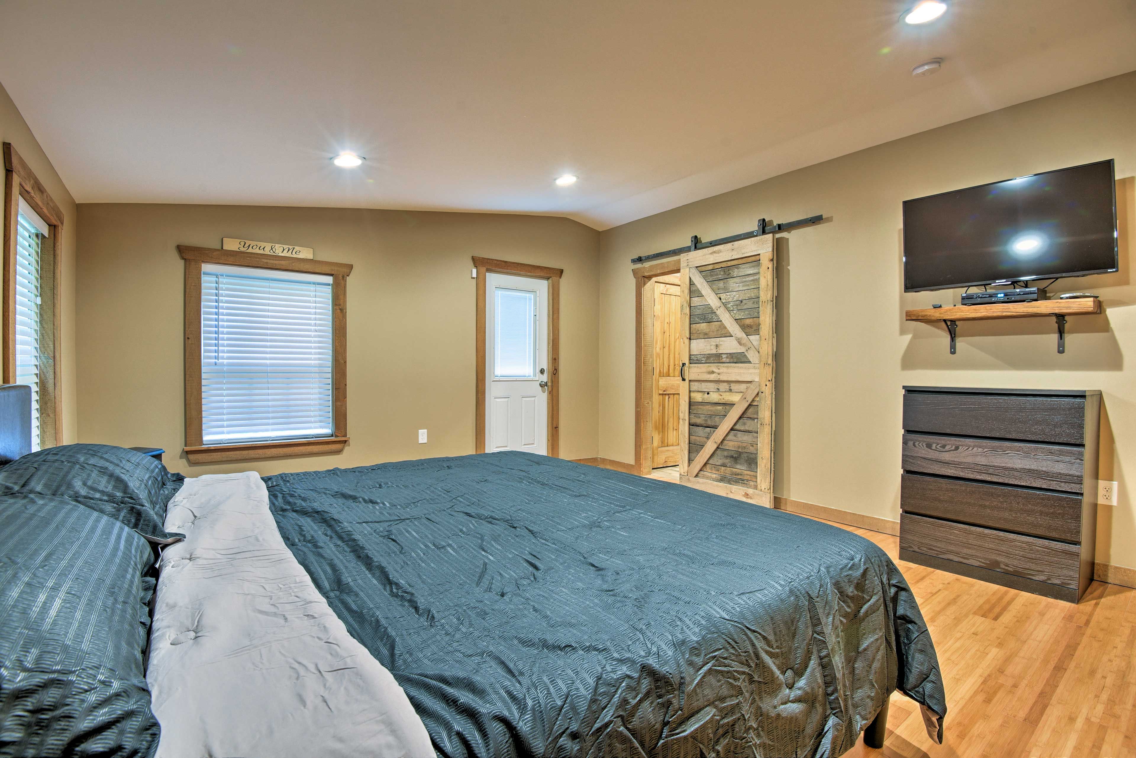 Bedroom 1 has a flat-screen cable TV.